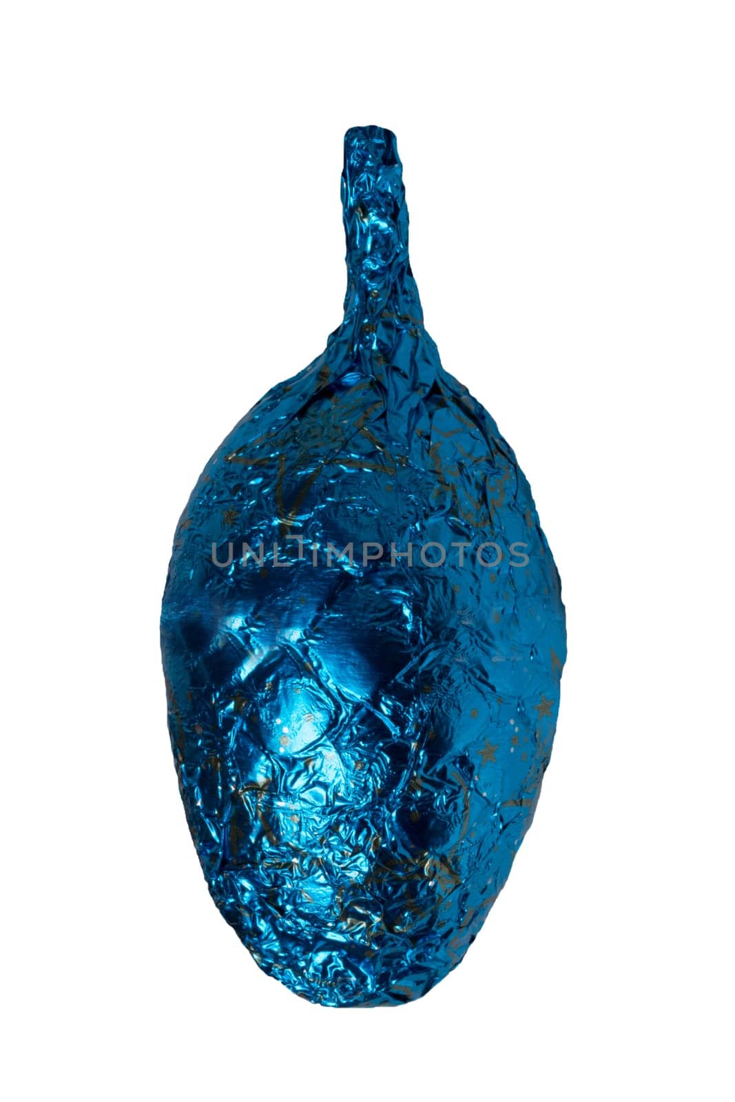Christmas tree decorations. Close-up of cheerful wrapped chocolate xmas balls, cones and bell figurines isolated on a white background. Macro photograph.