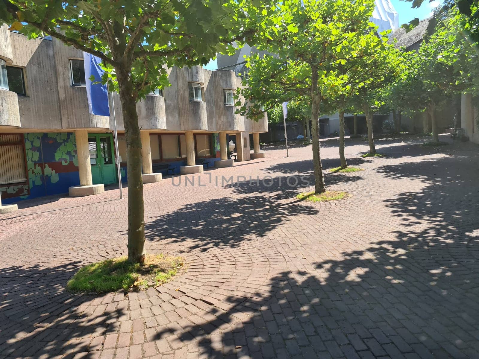 Neviges District, Velbert City, Germany - March 2019: Outdoor sunny view of Mariendom, landmark and famous church with massy concrete brutalism architectural style was designed by Gottfried Böhm.