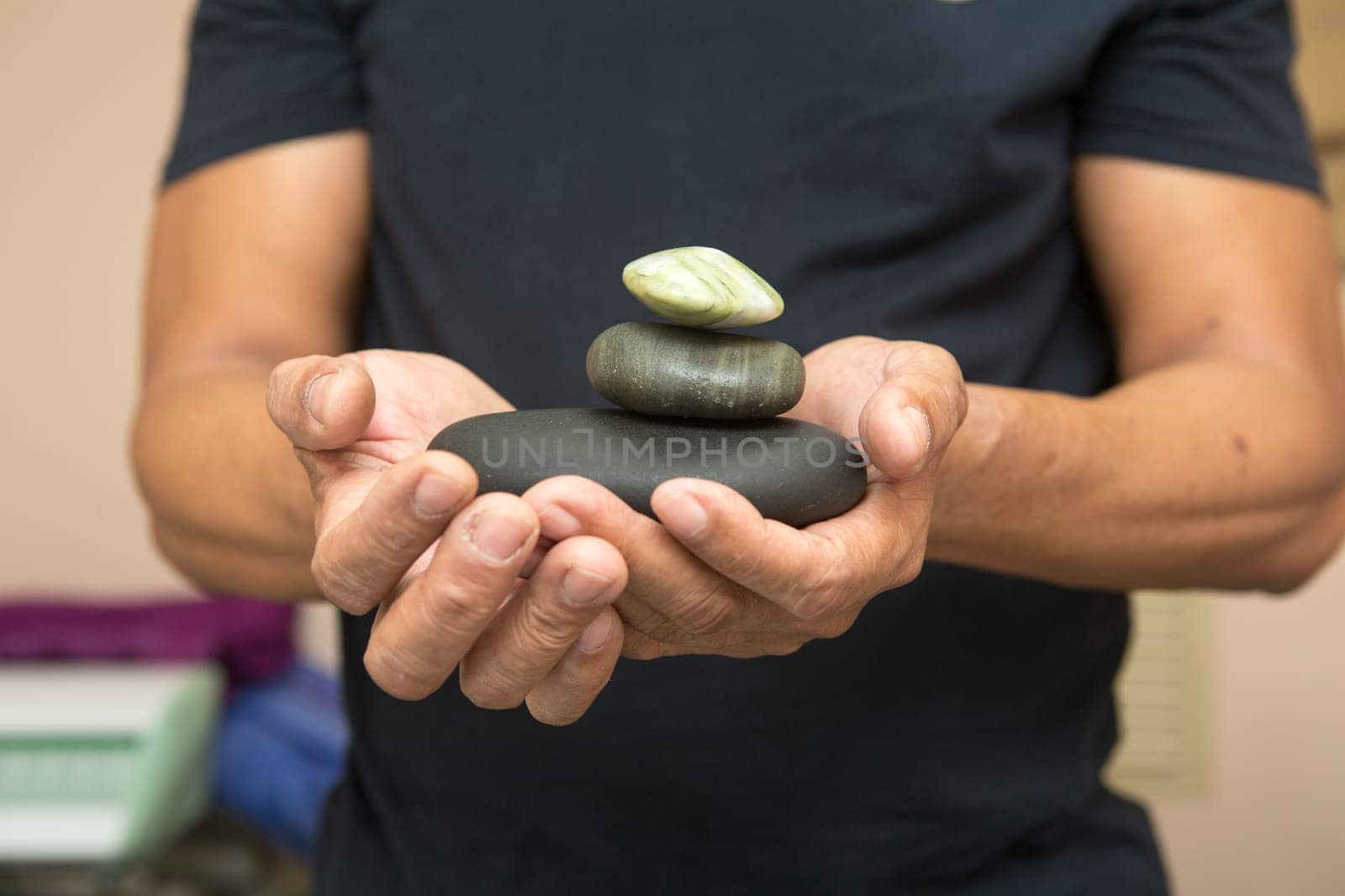 stones for stone therapy in the hands.
