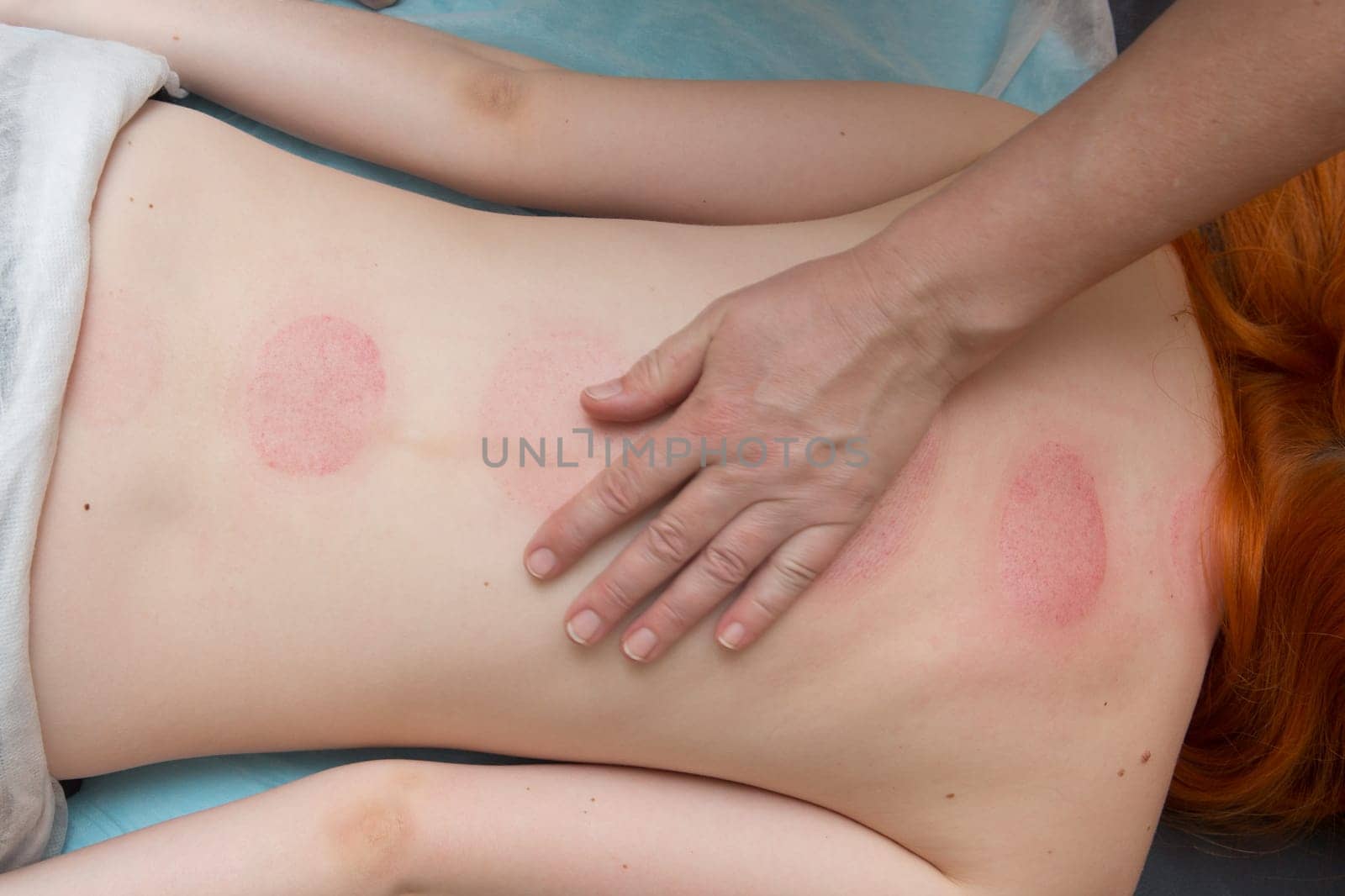 Tired worried man enjoying therapeutic massage