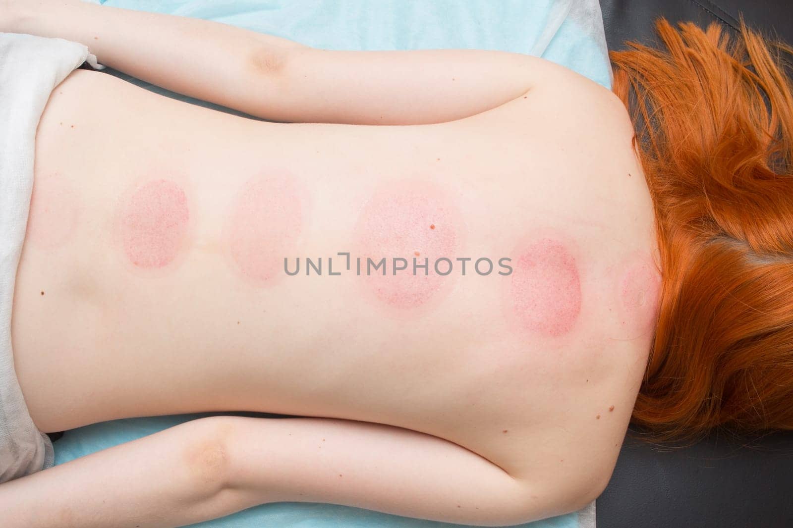 Tired worried man enjoying therapeutic massage