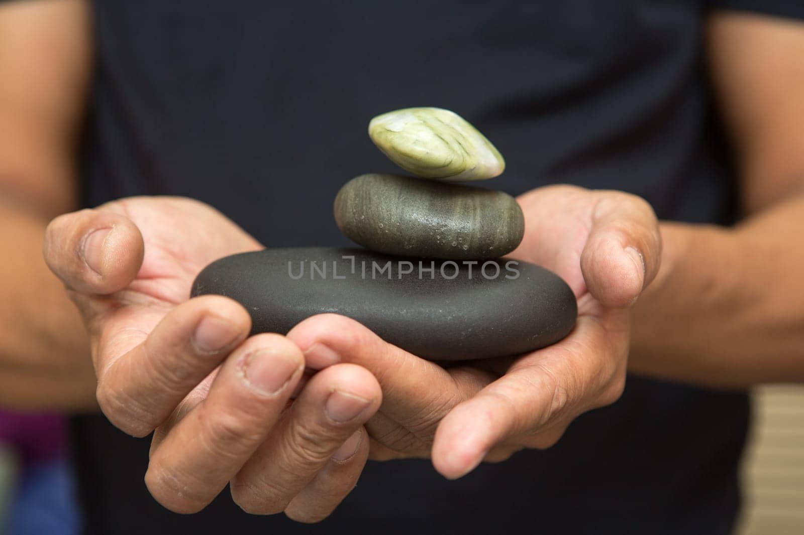 stones for stone therapy in the hands.