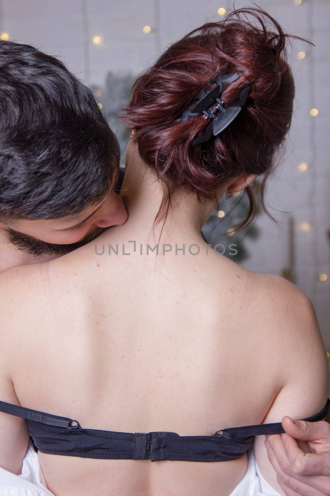 Pure passion.A man hugs and kisses a woman.