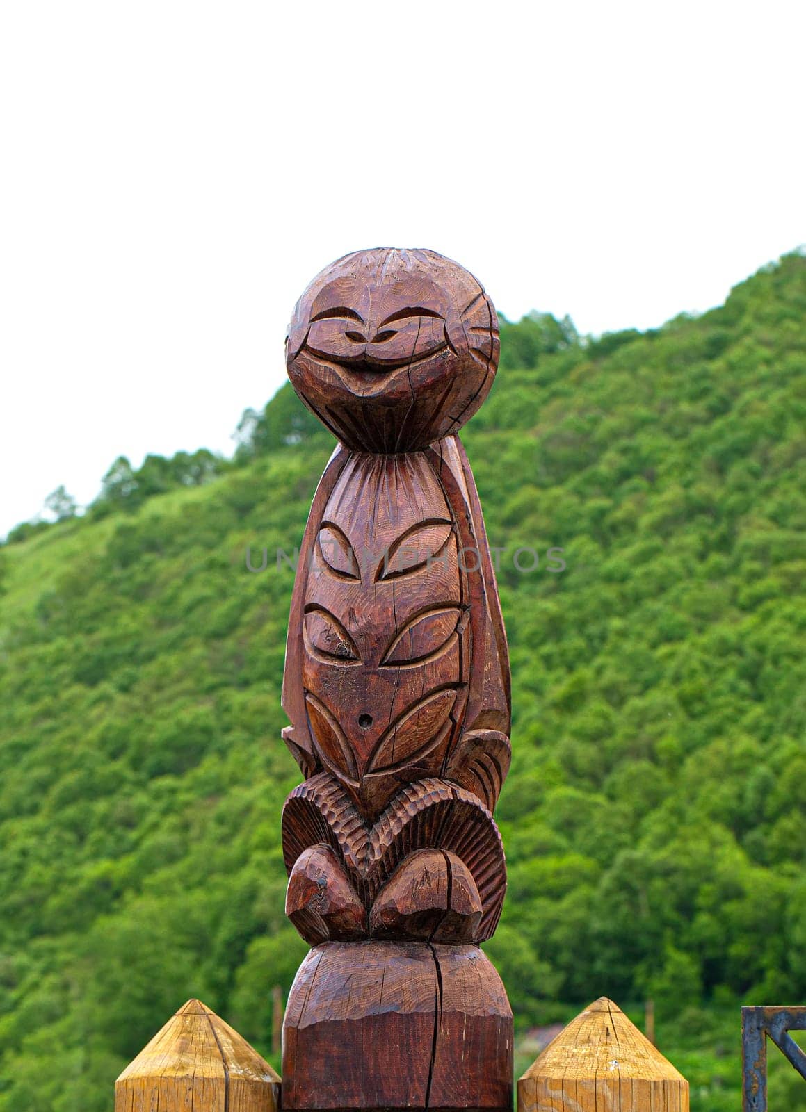 The wooden idol statue of koryak on Kamchatka peninsula