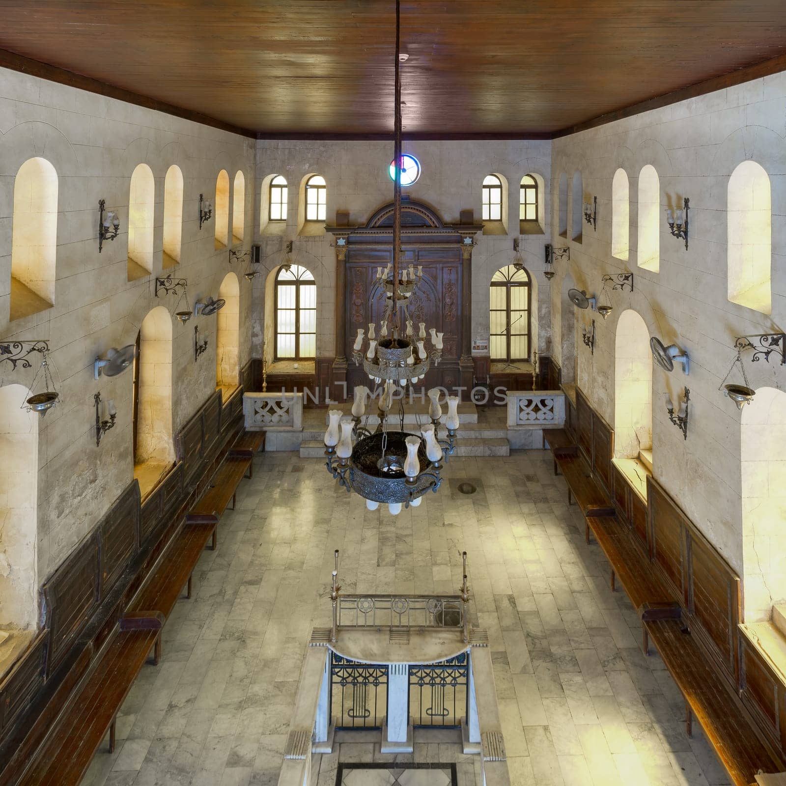 From above interior view of historic Jewish Maimonides Synagogue or Rav Moshe Synagogue with arched windows and chandelier in Gamalia district, Cairo Egypt