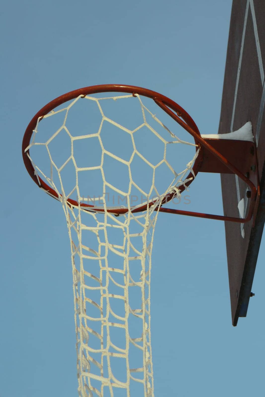 basketball hoop long mesh, street basketball concept, low angle of view