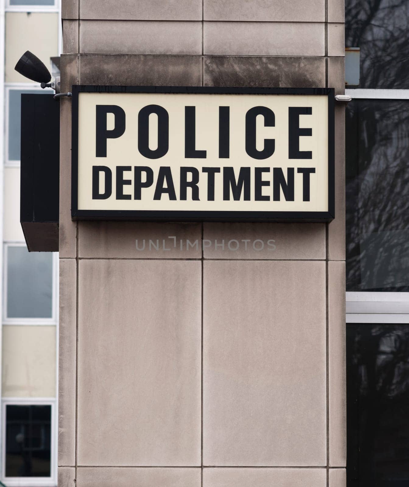 Vertical composition of Police Department sign outside