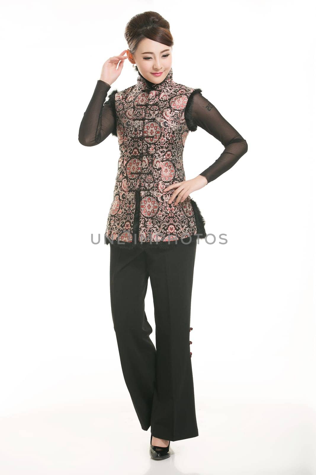 Wearing Chinese clothing waiter in front of a white background