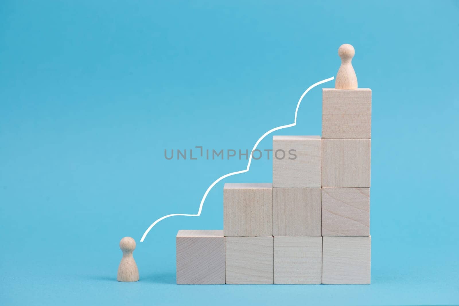 Wooden cubes building stairs, one person is standing at the bottom and the other men is standing on top, different positions