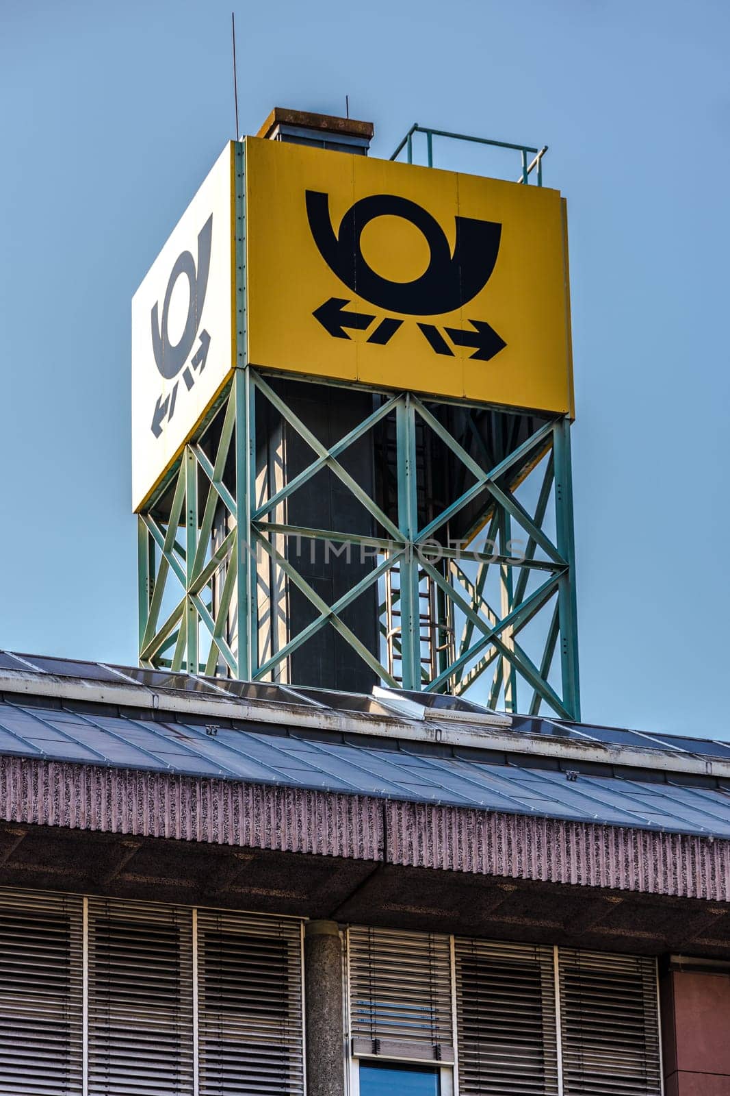 GIESSEN, GERMANY - 2021_04_09: the logo of the brand "Deutsche Post"" at a delivery point in Giessen. Deutsche Post DHL is the world's largest courier company."