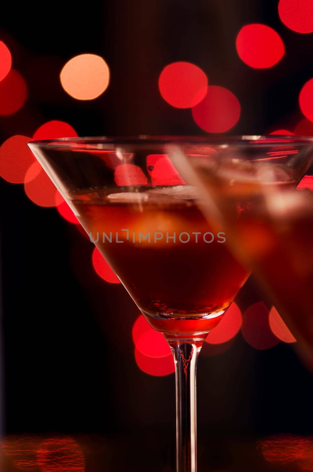 Red cocktail in martini glasses