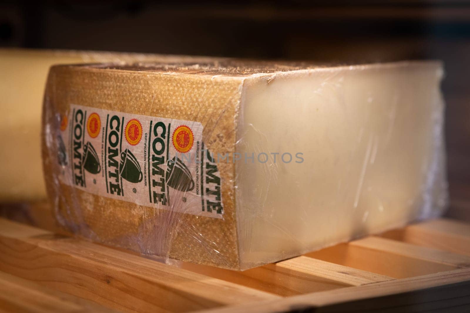 December 3 2021, Lyon, Rhone Alpes Auvergne, France : Comte famous cheese from Jura wheel in a ripening cellar