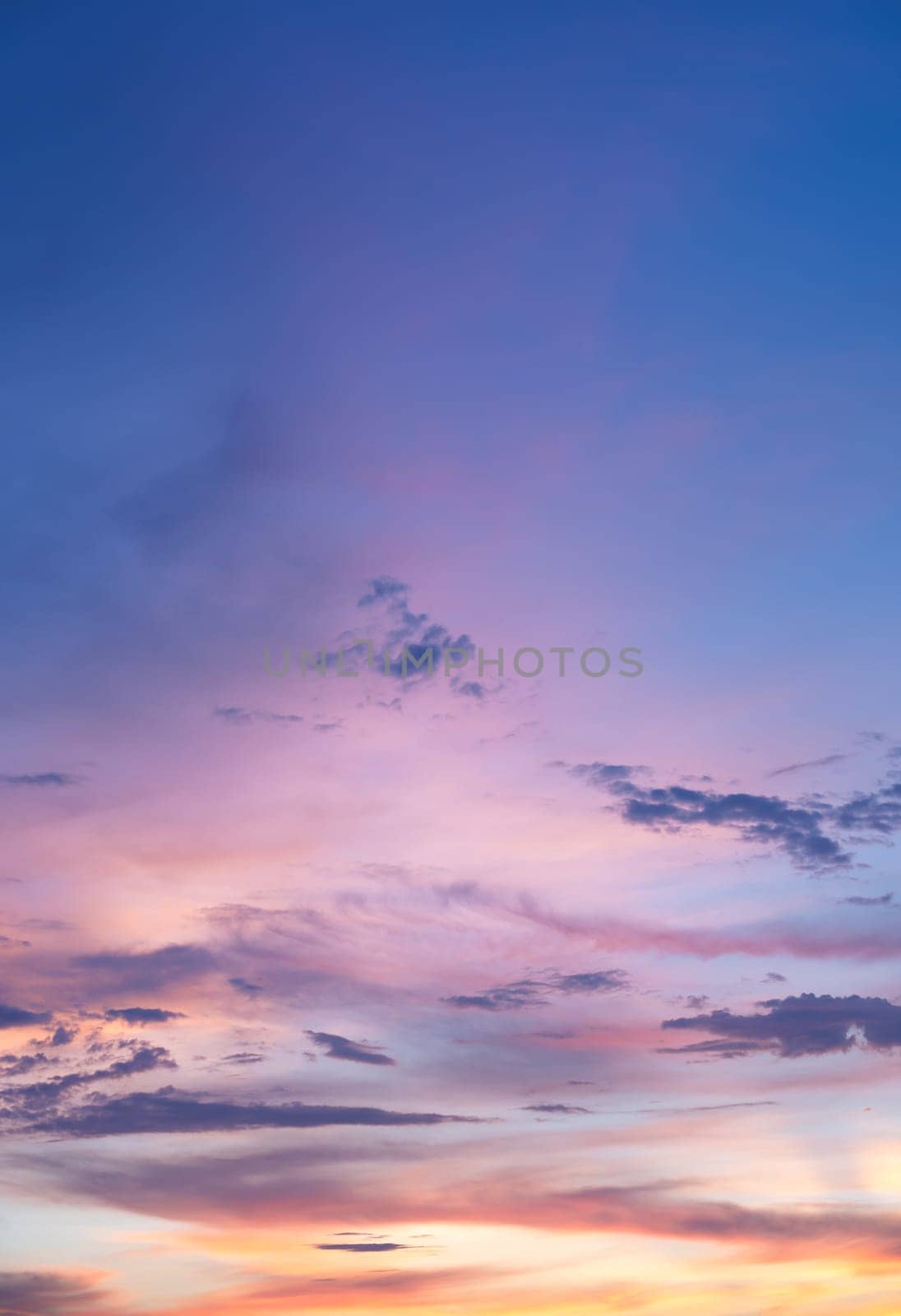 Background of colorful sky. Dramatic sunset with twilight color sky and clouds
