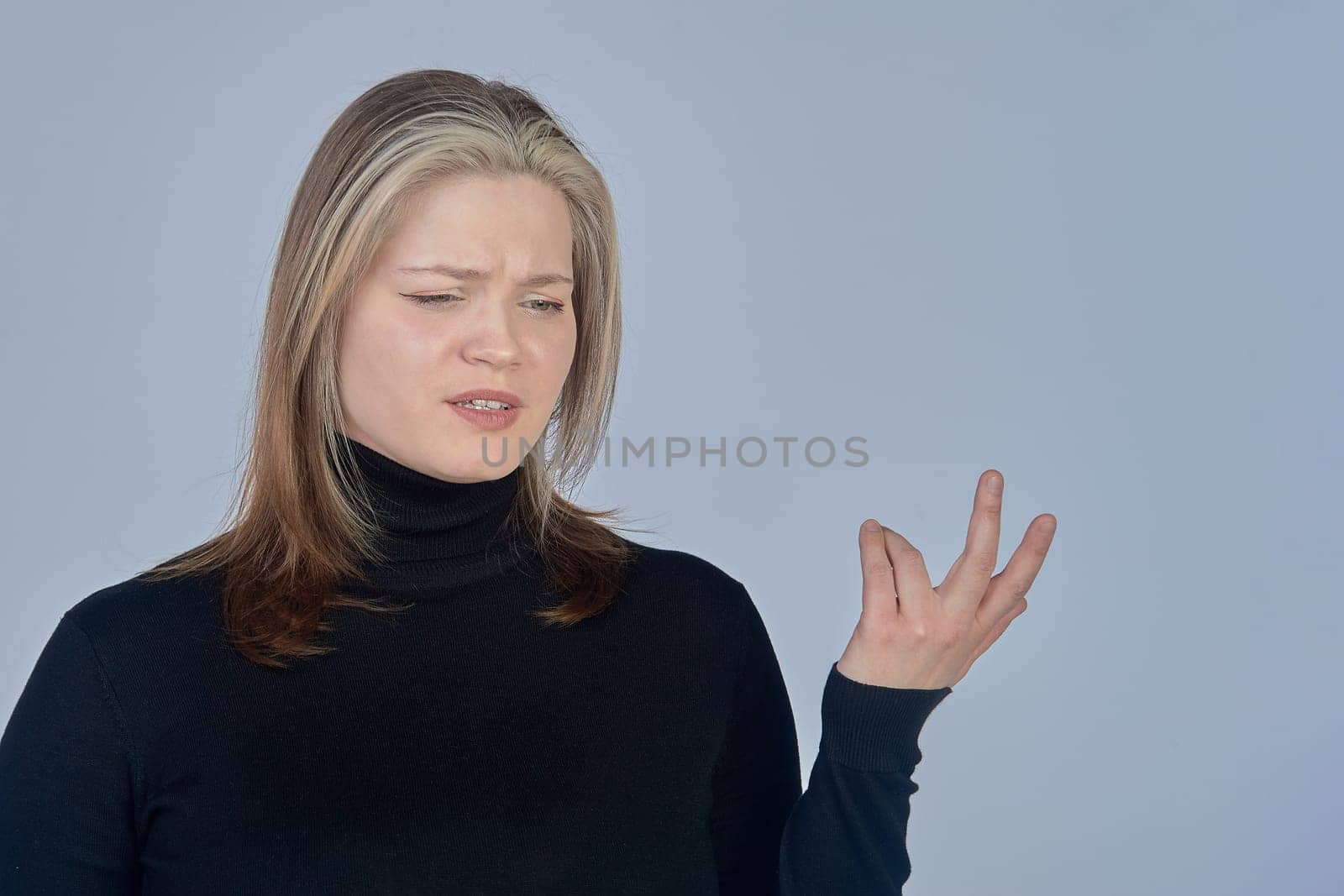 a woman is surprised by something in the background. High quality photo