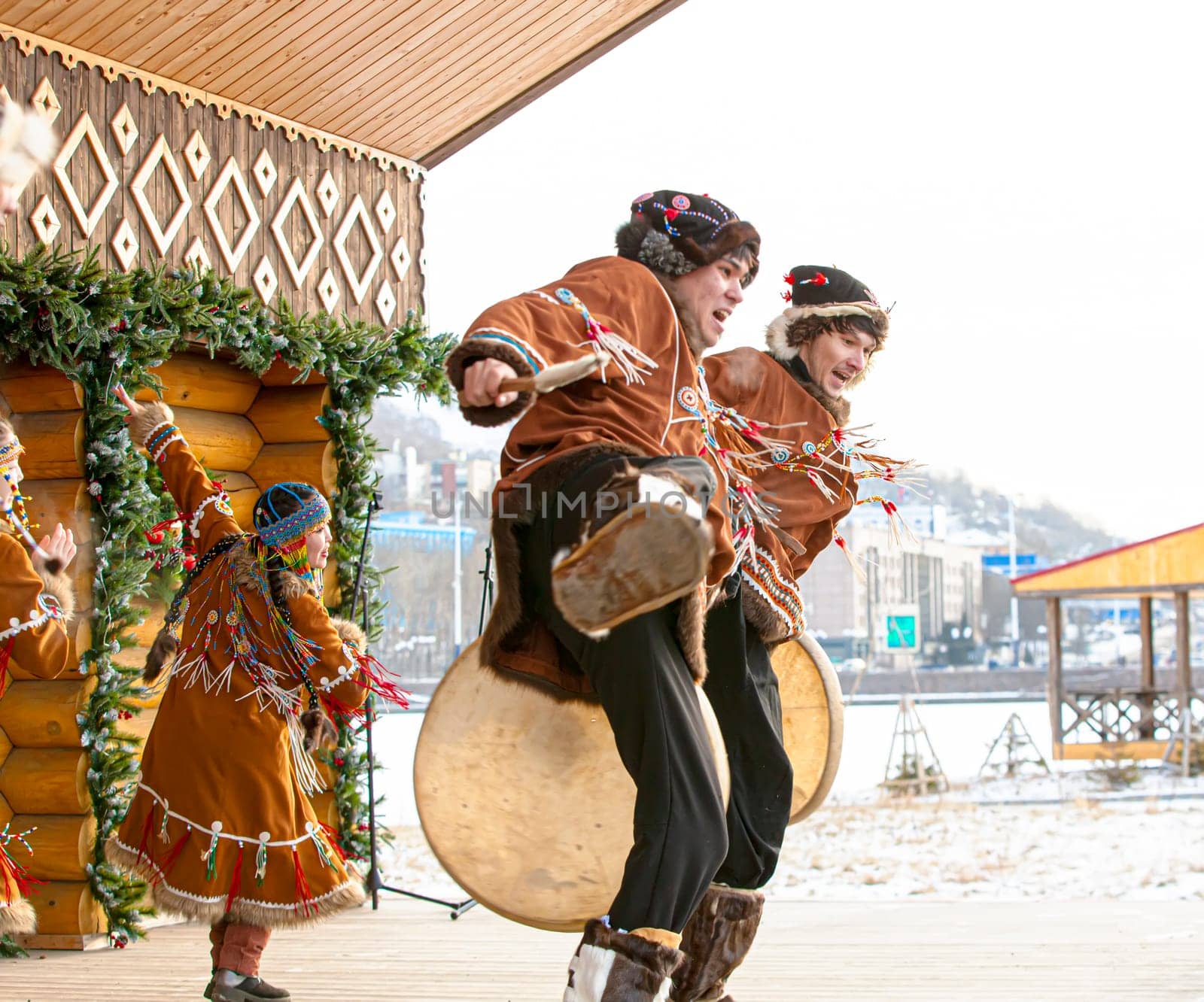 KAMCHATKA, RUSSIA - DECEMBER 24, 2021: Folk ensemble performance in dress of indigenous people of Kamchatka.