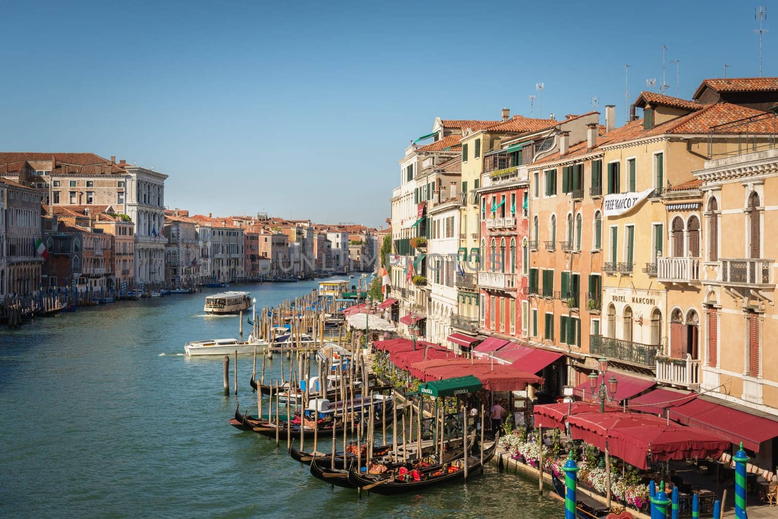 view of the Canale Grande in central Venice with many boats travelling about
