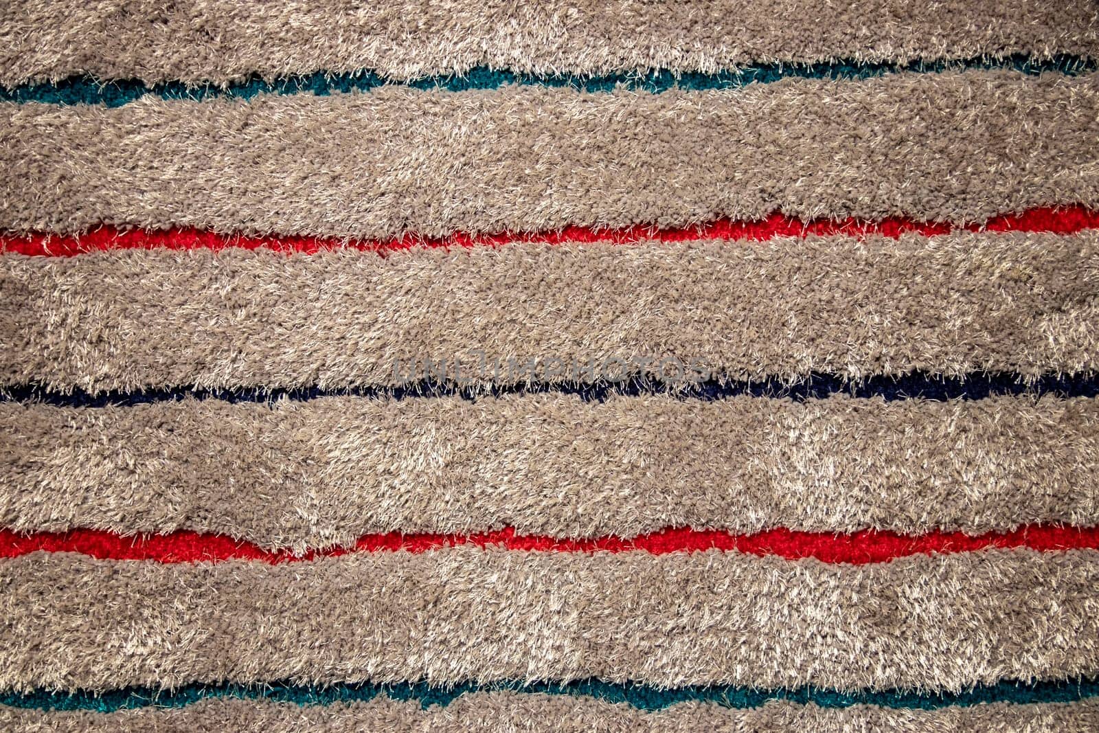Coir fibre background texture. Close-up of details of a natural brown coconut doormat for the house entrance. Top view. Abstract backdrop with space.