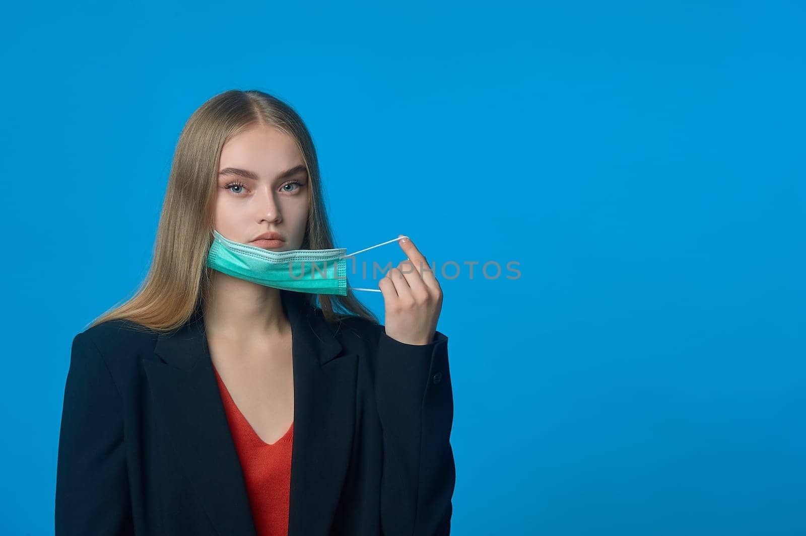 girl with a medical mask on her . High quality photo