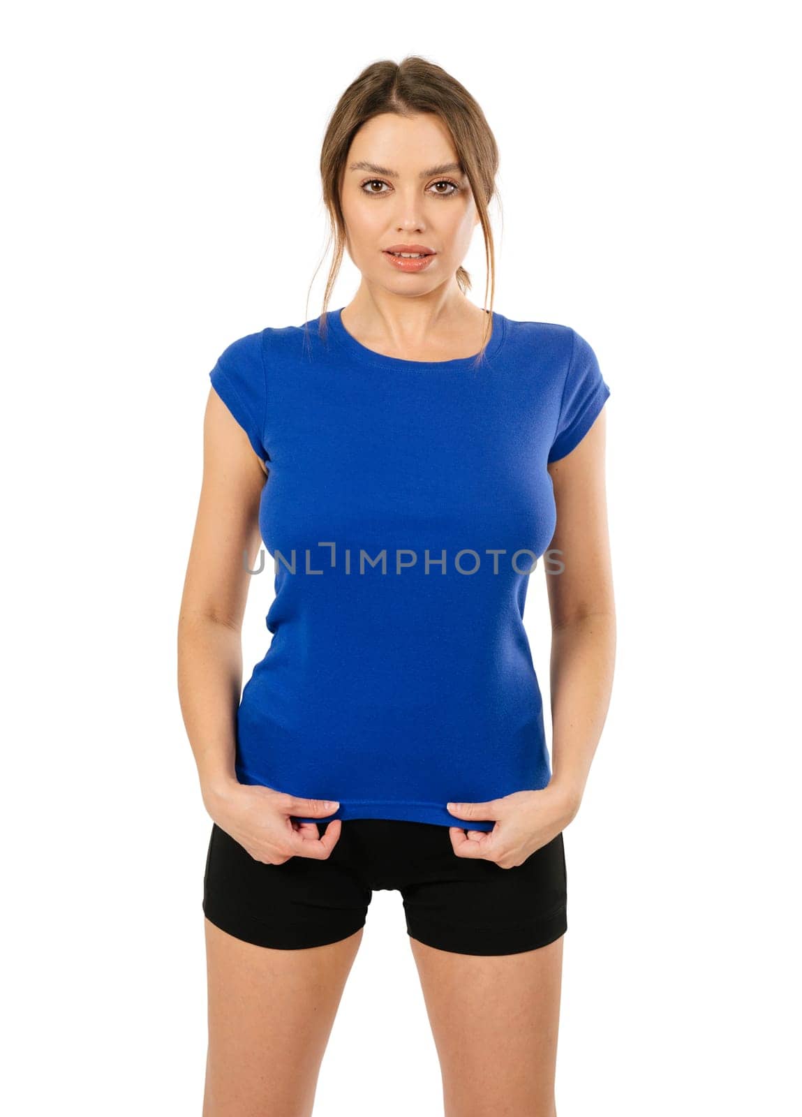 Young beautiful brunette woman with blank blue shirt. Ready for your design or artwork.