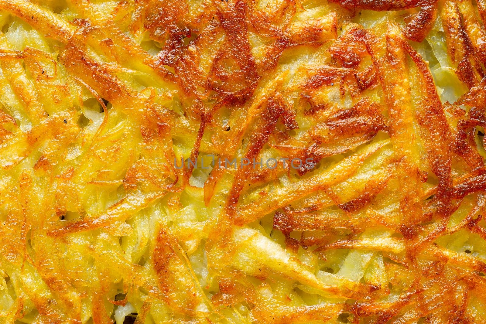 close up of golden swiss rosti potato pancake food background