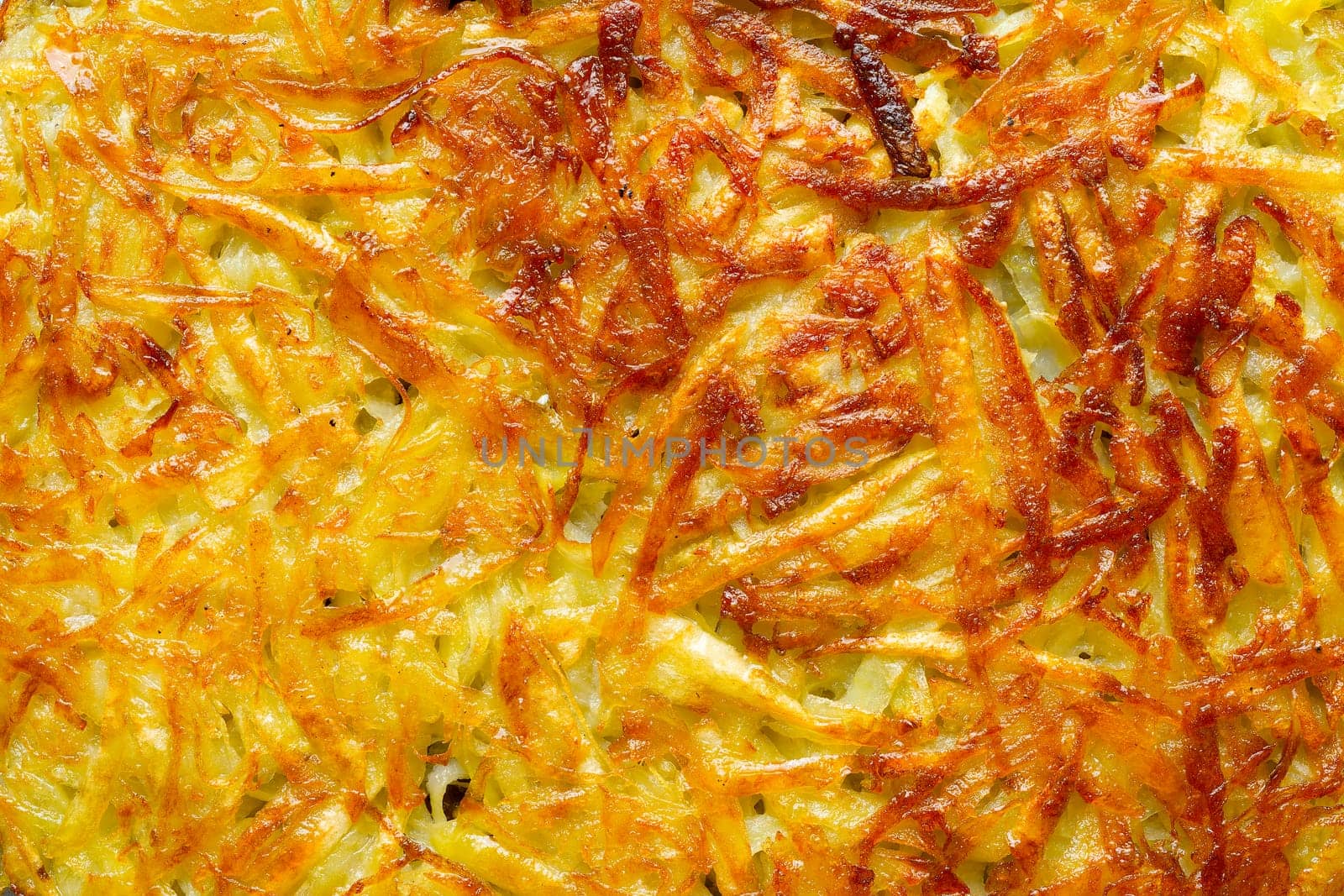 close up of golden swiss rosti potato pancake food background