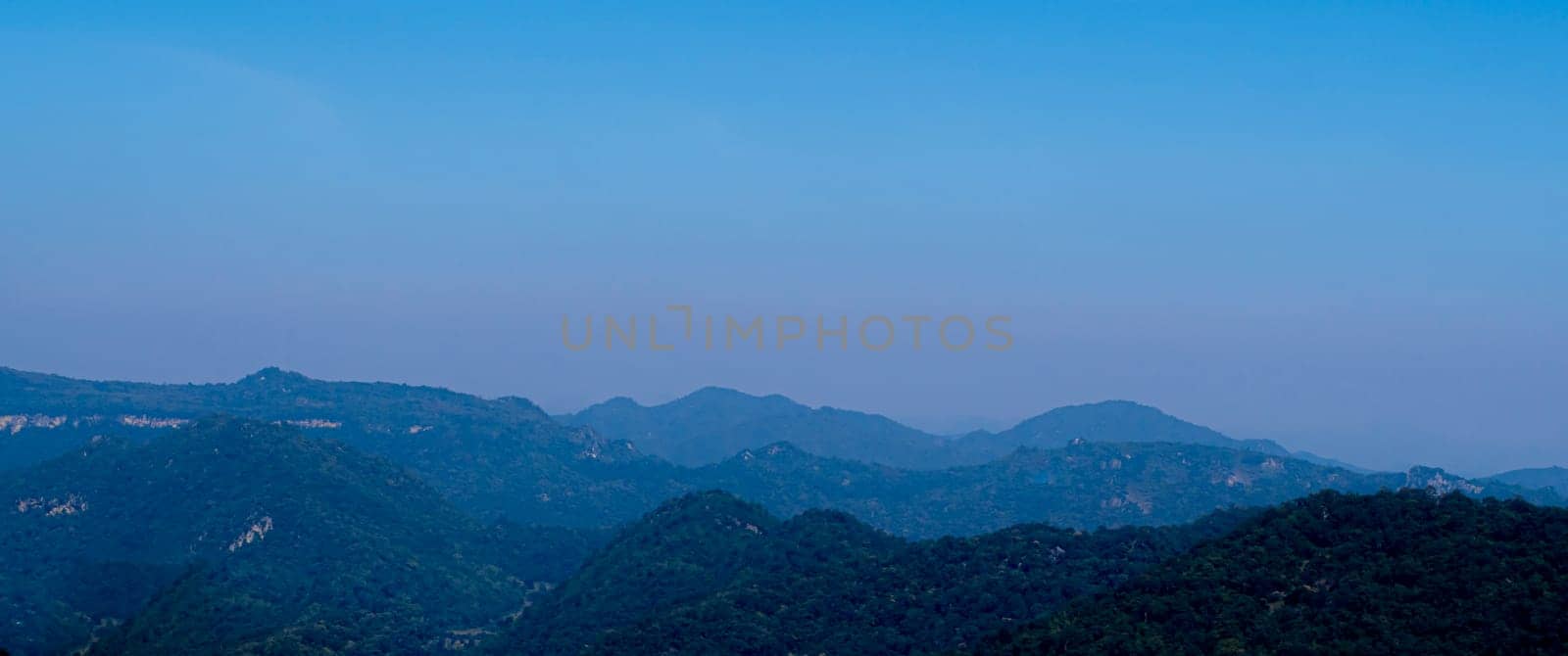 Spectacular blue and cyan mountain range beautiful nature landscape travel vacation time.