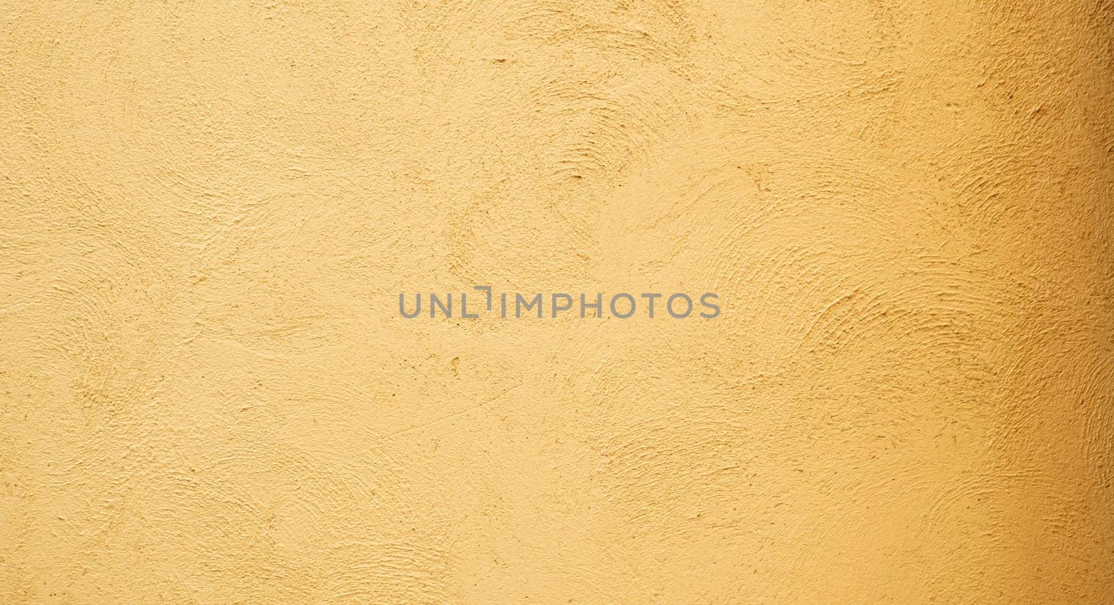 Abstract background from stucco concrete wall with sunlight, light and shadow