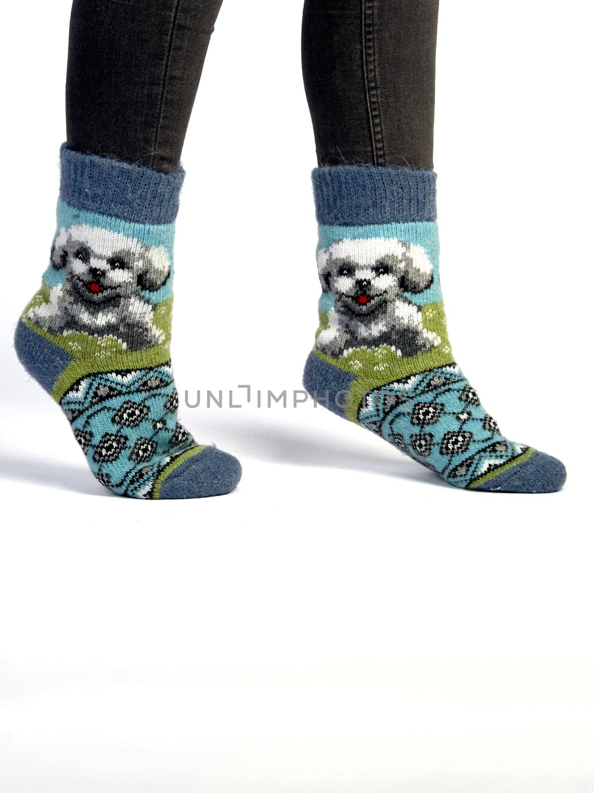 Wool socks worn on women's feet. High quality photo