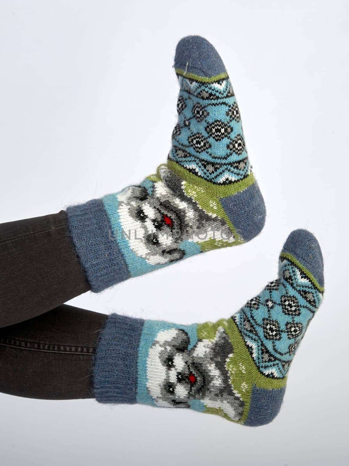 Wool socks worn on women's feet. High quality photo