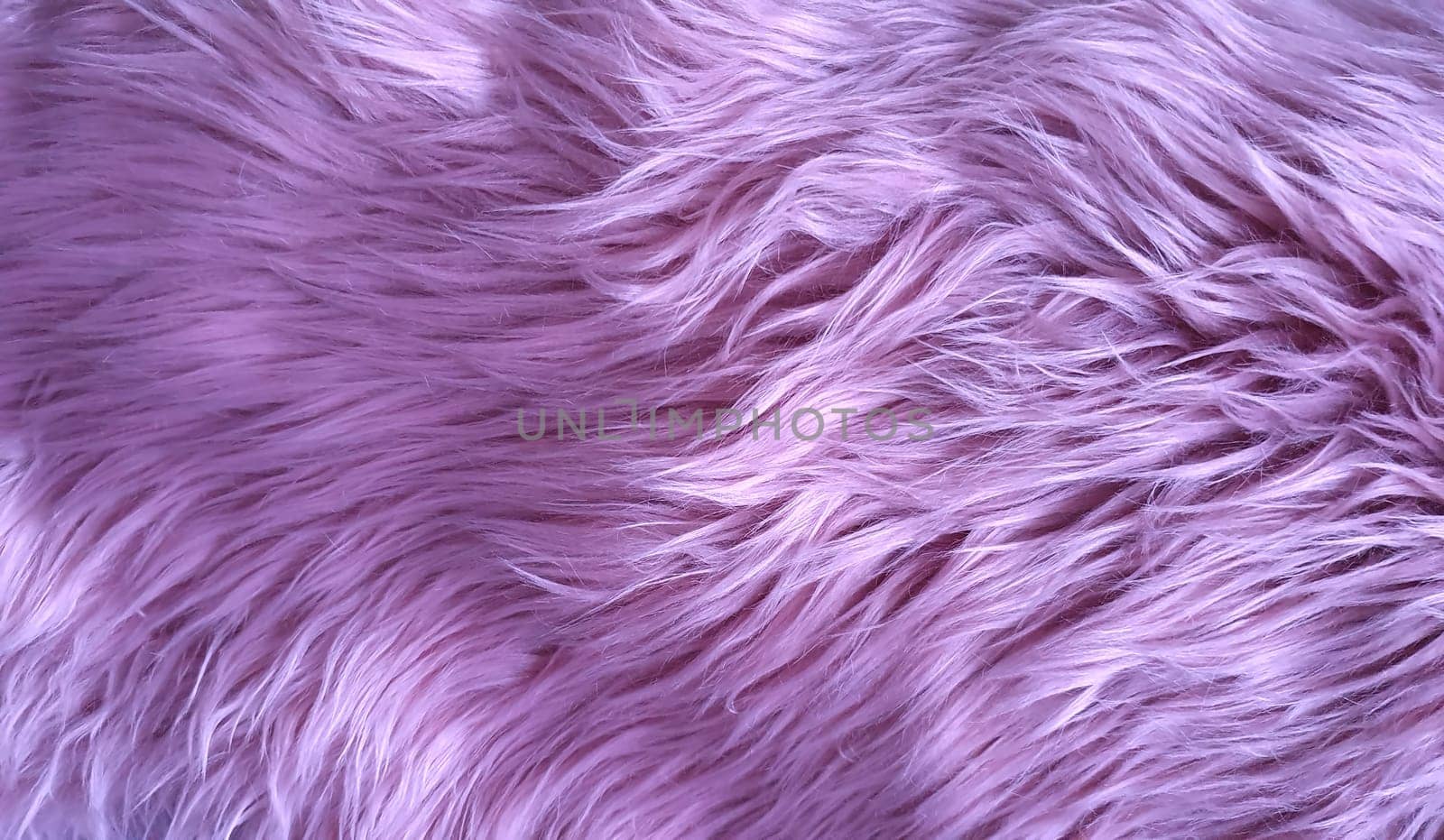 Pink natural fur background texture for design