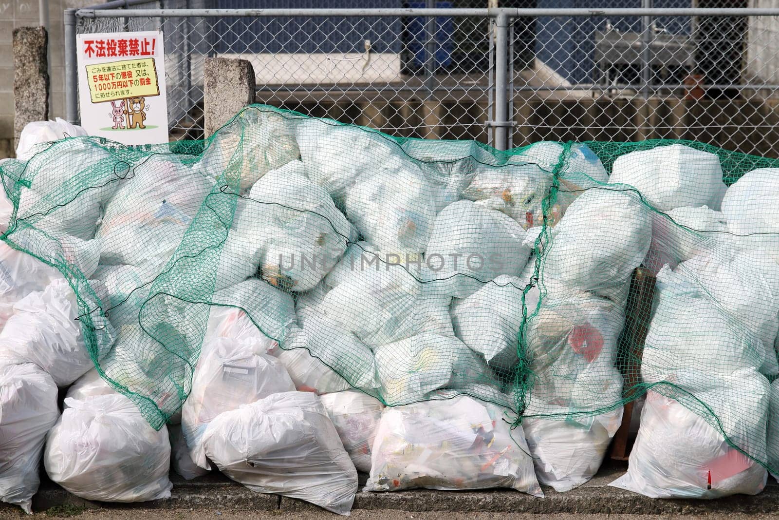 KAGAWA, JAPAN -JANUARY 06, 2016: Sorted garbage bags or waste bag. Designated place to dispose of garbage in Kagawa, Japan.