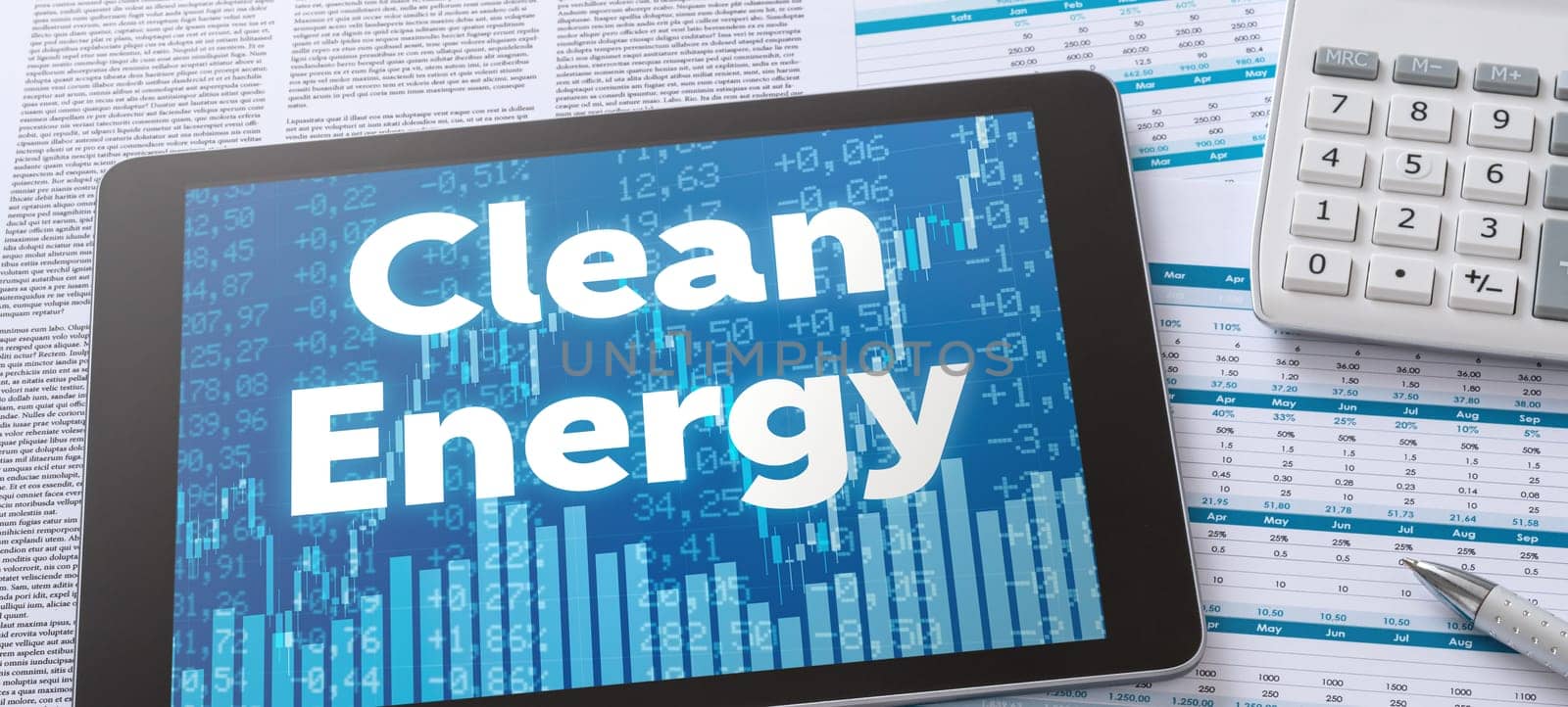 A tablet with financial documents - Clean Energy