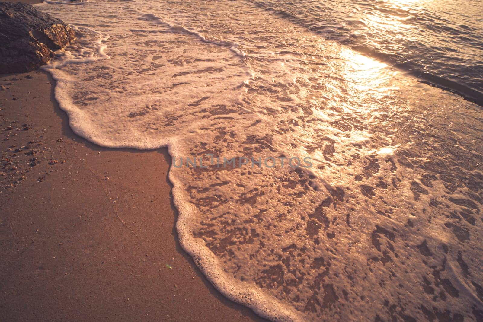 Soft Blue Waves on the beach at the summer time. sea beach blue sky sand sun daylight relaxation landscape viewpoint. The color of the water and beautifully bright clear water.