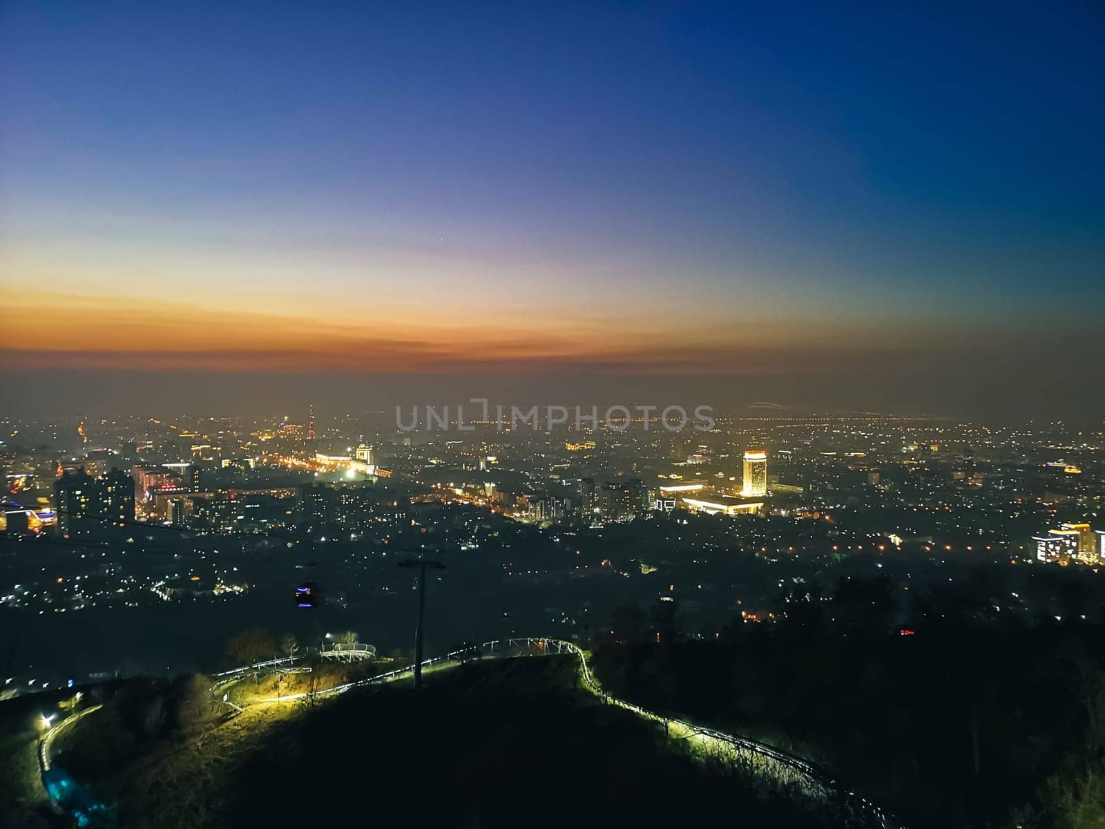 Night view from Kok Tobe Mountain to the city of Almaty.