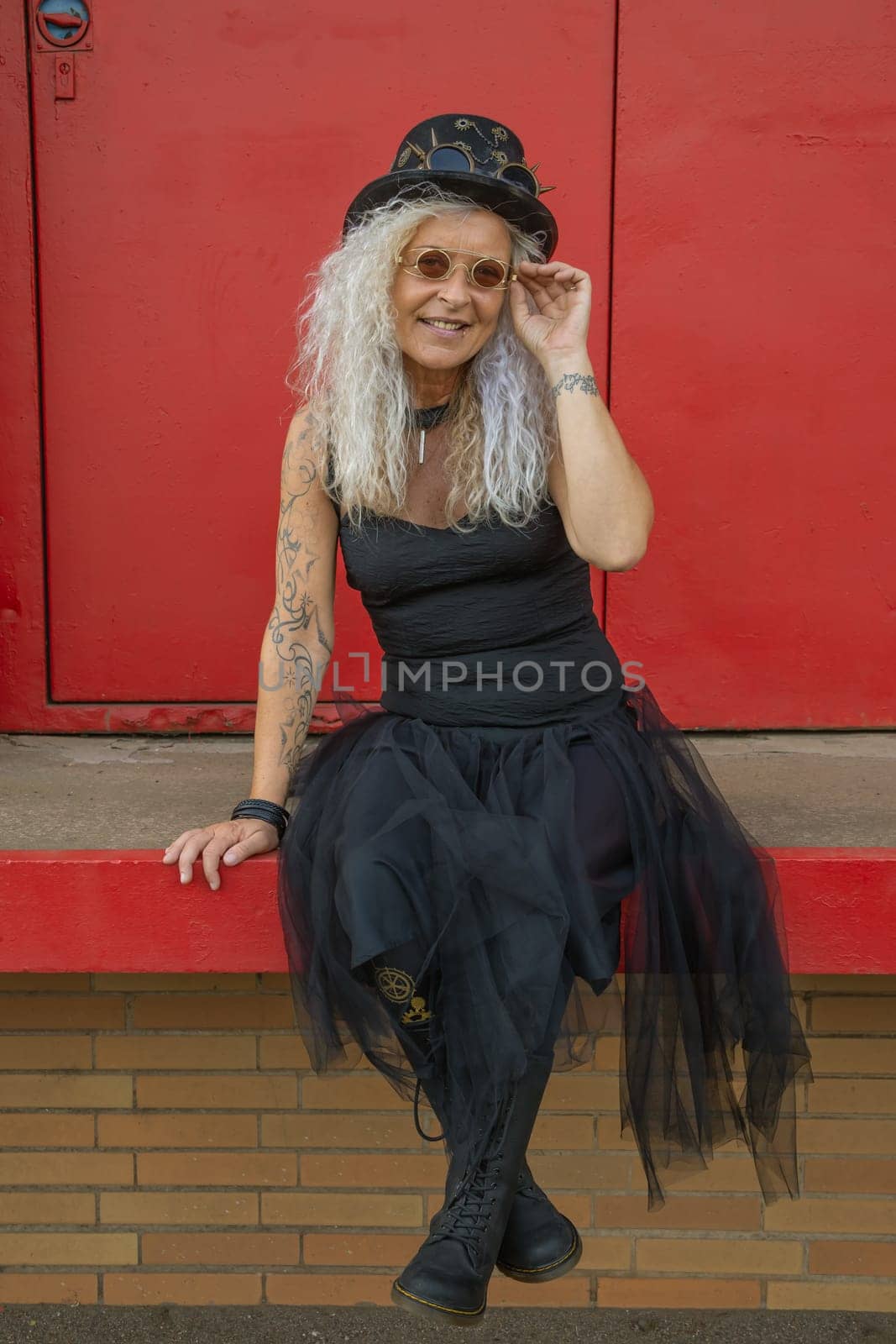 Beautiful Steampunk Lady on a old red Wall Background