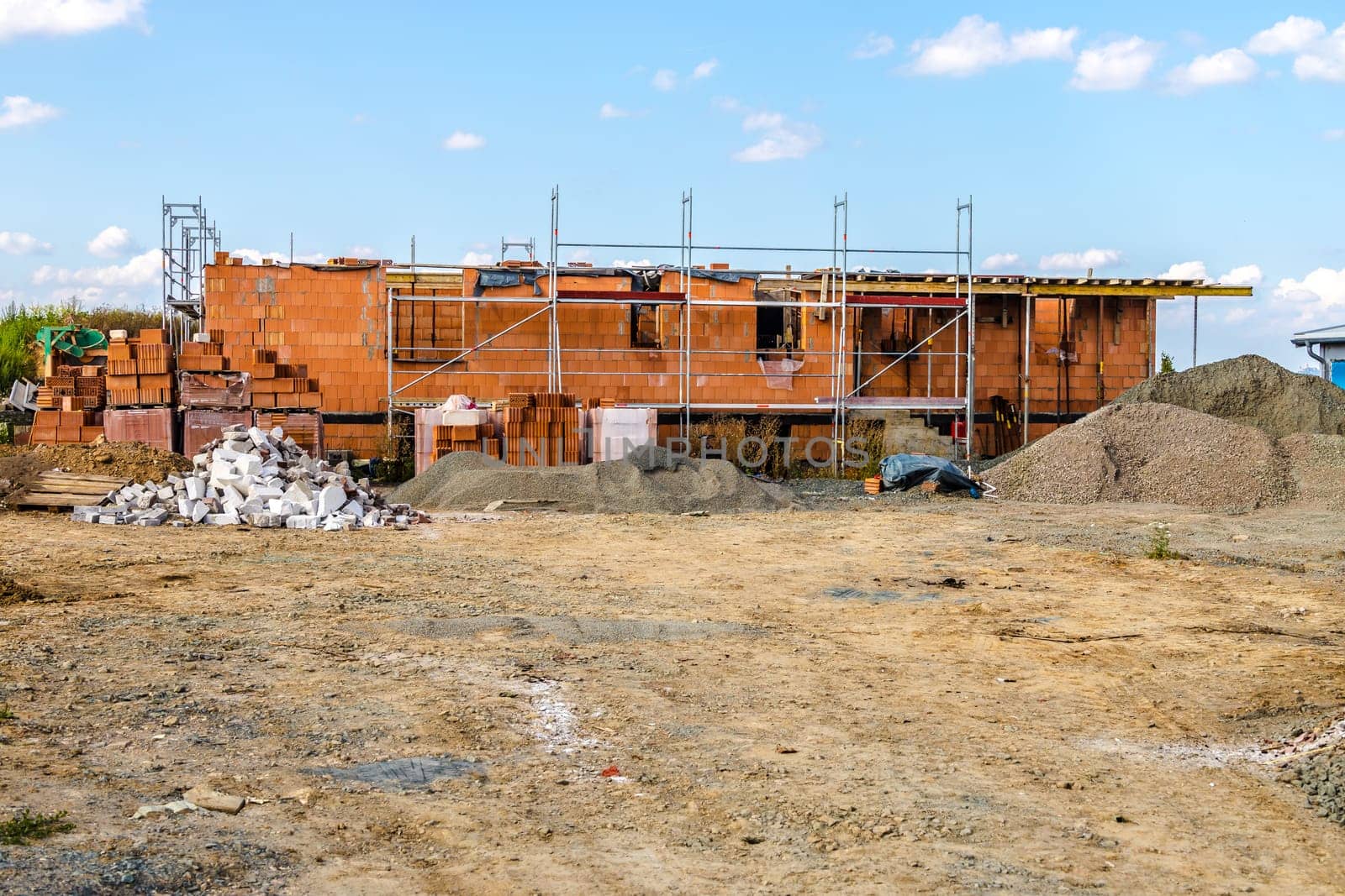 Area from single family house construction with building rails and gravel.