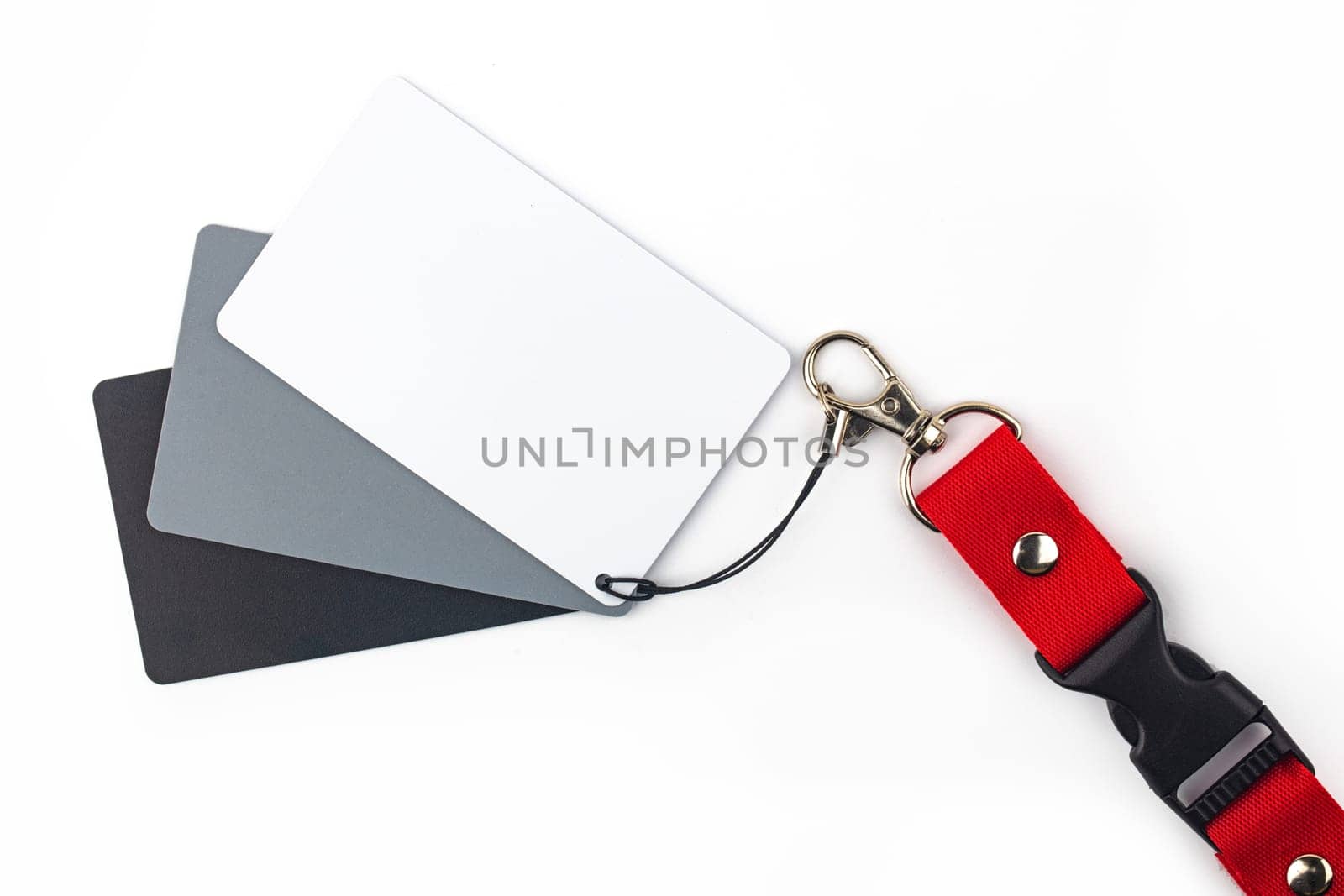 White, gray and black color balance card isolated over white background