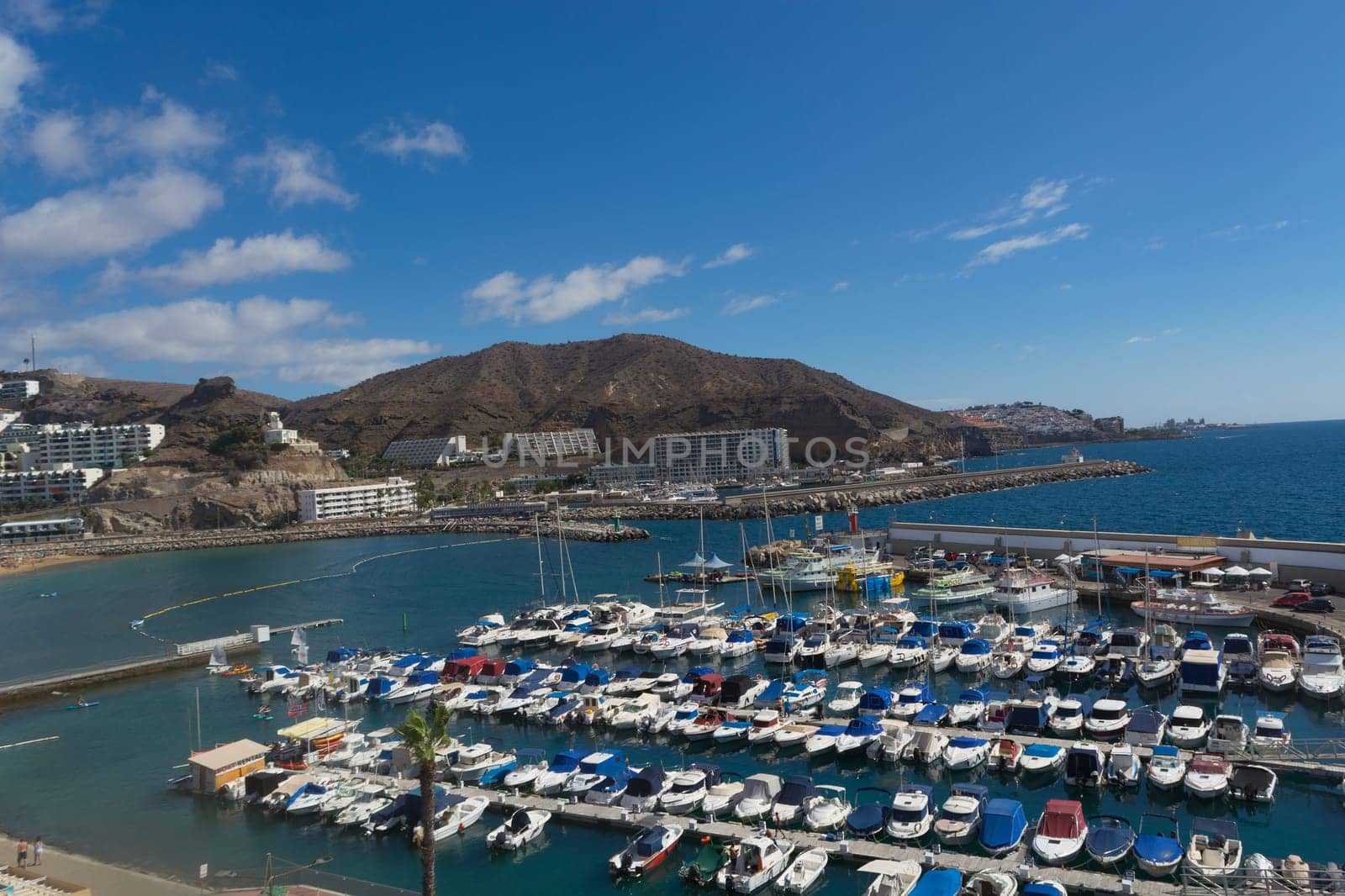 CRAN CANARIA, PUERTO RICO - NOVEMBER 16, 2019:.Marina in Puerto Rico de Gran Canaria. Postcard, spain.