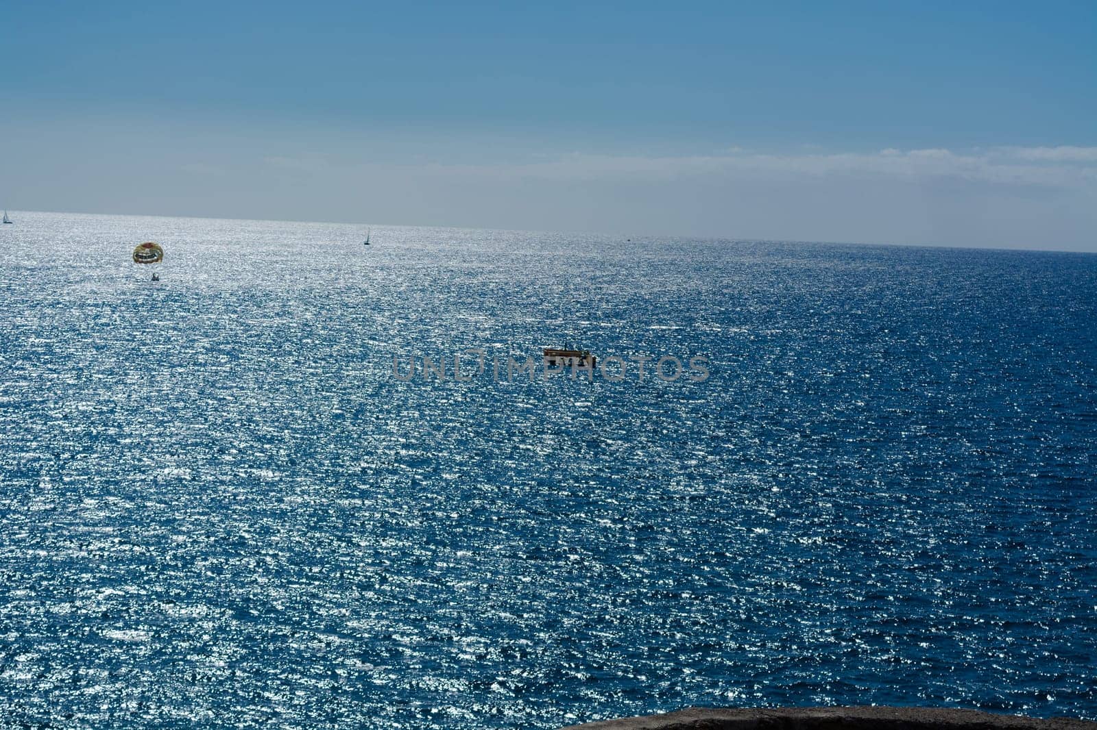 Parasailing, boat parachute. Summer water beach extreme sports..
