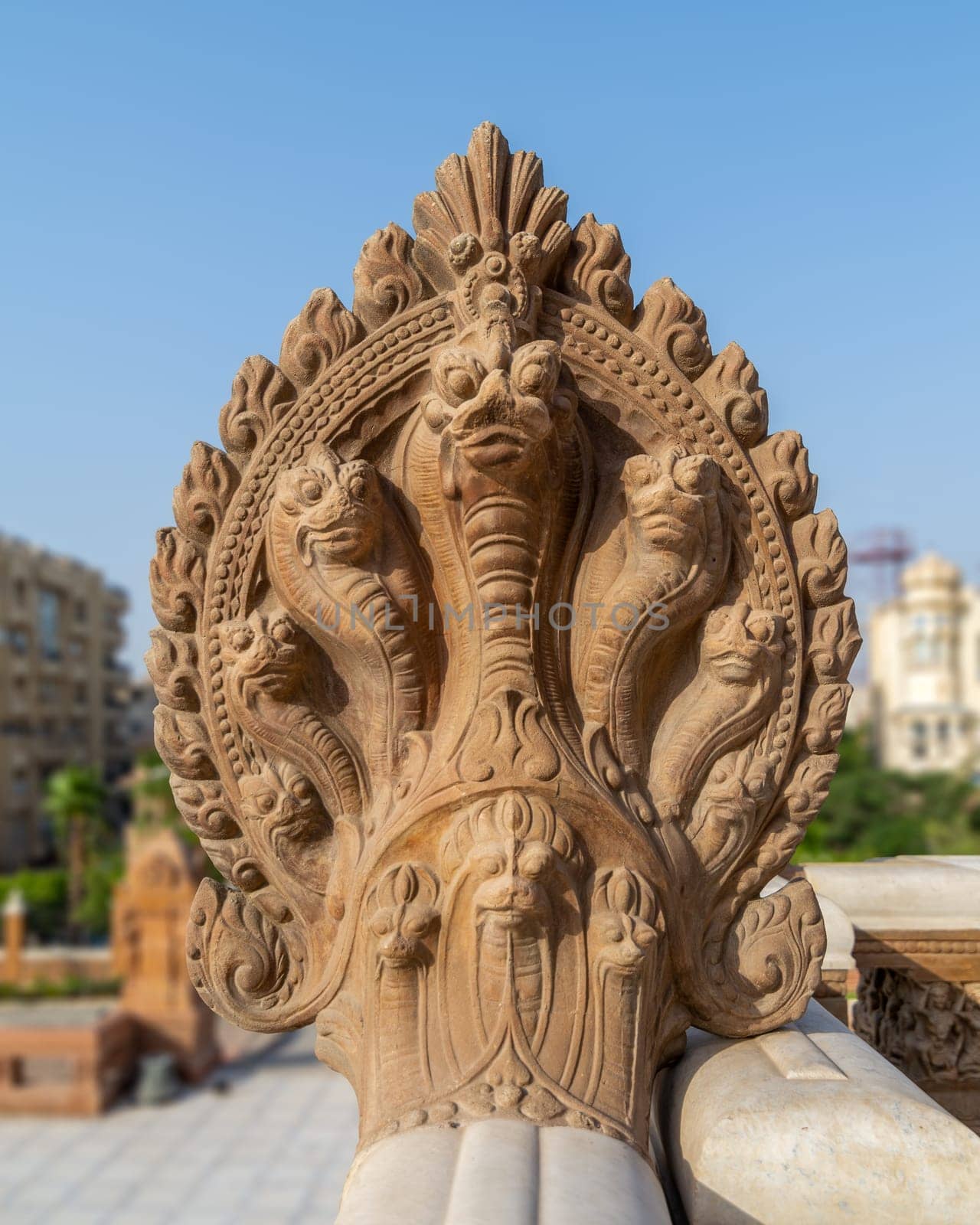 Hindu statue of snakes, One of the Indonesian statues studding the external terrace of historical palace of Baron Empain, Cairo, Egypt