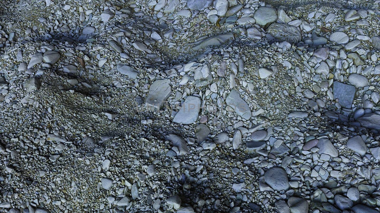 Realistic beach terrain with blurred sea of mounds of stones 3D render with convex curvatures and irregularities. Piles of small and large pebbles lying in random order and crumbling.