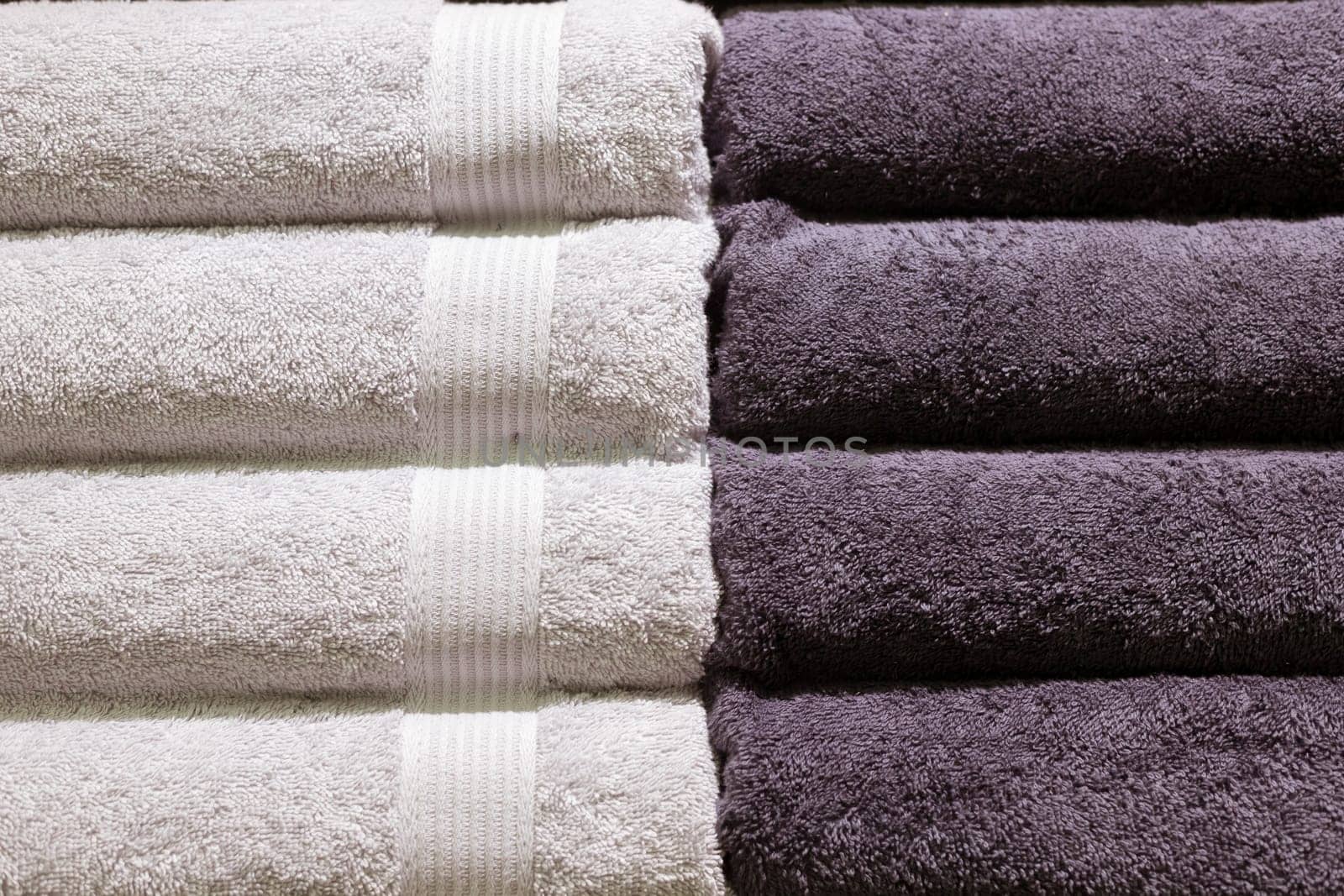 Stack of fluffy towels in store. Background.