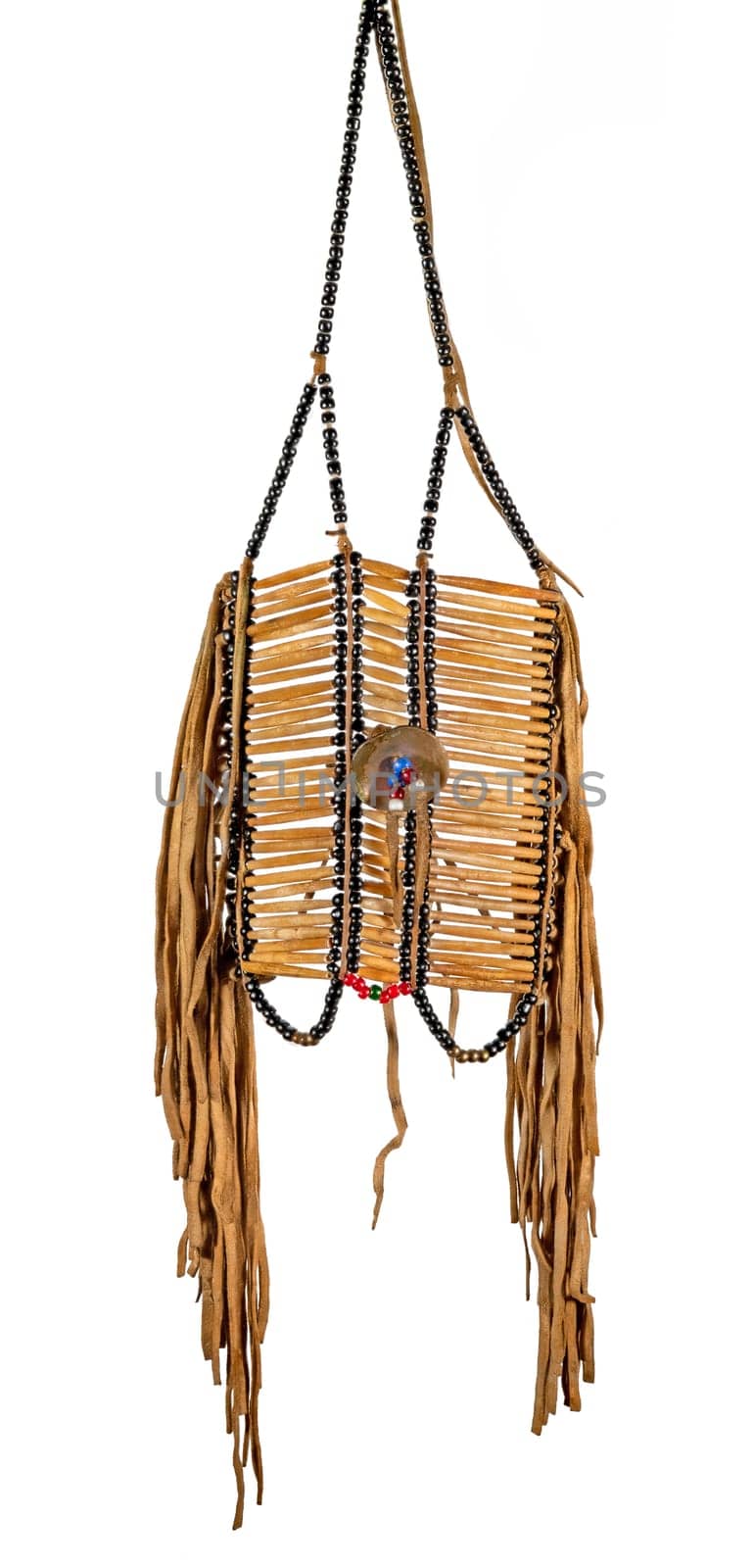 Ancient North American Indian breastplate made of bone and leather isolated on white