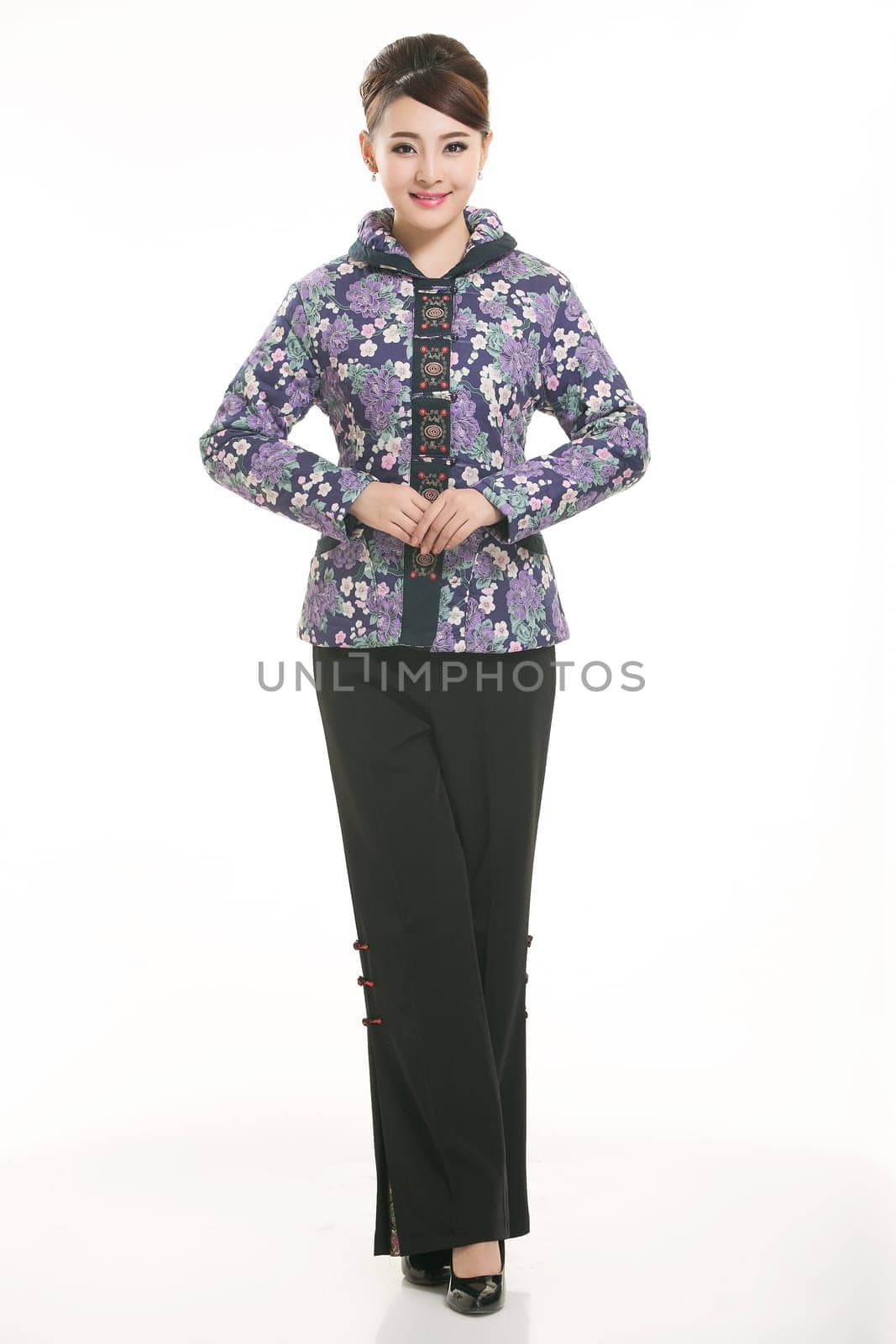 Wearing Chinese clothing waiter in front of a white background