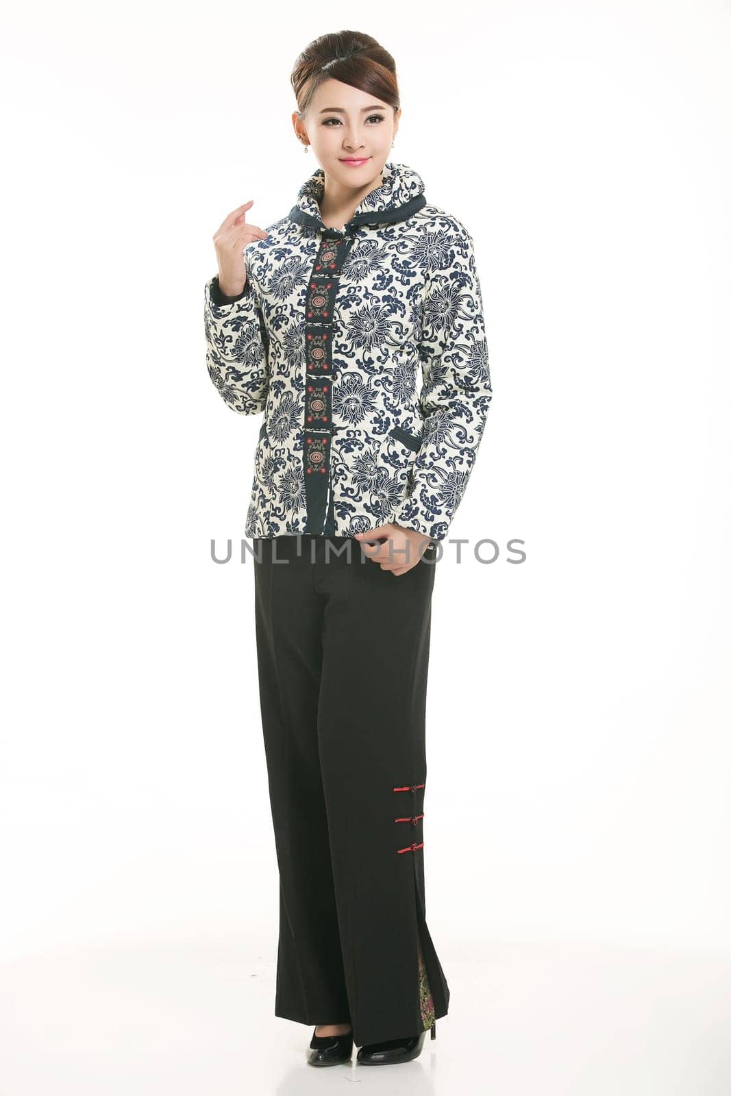 Wearing Chinese clothing waiter in front of a white background