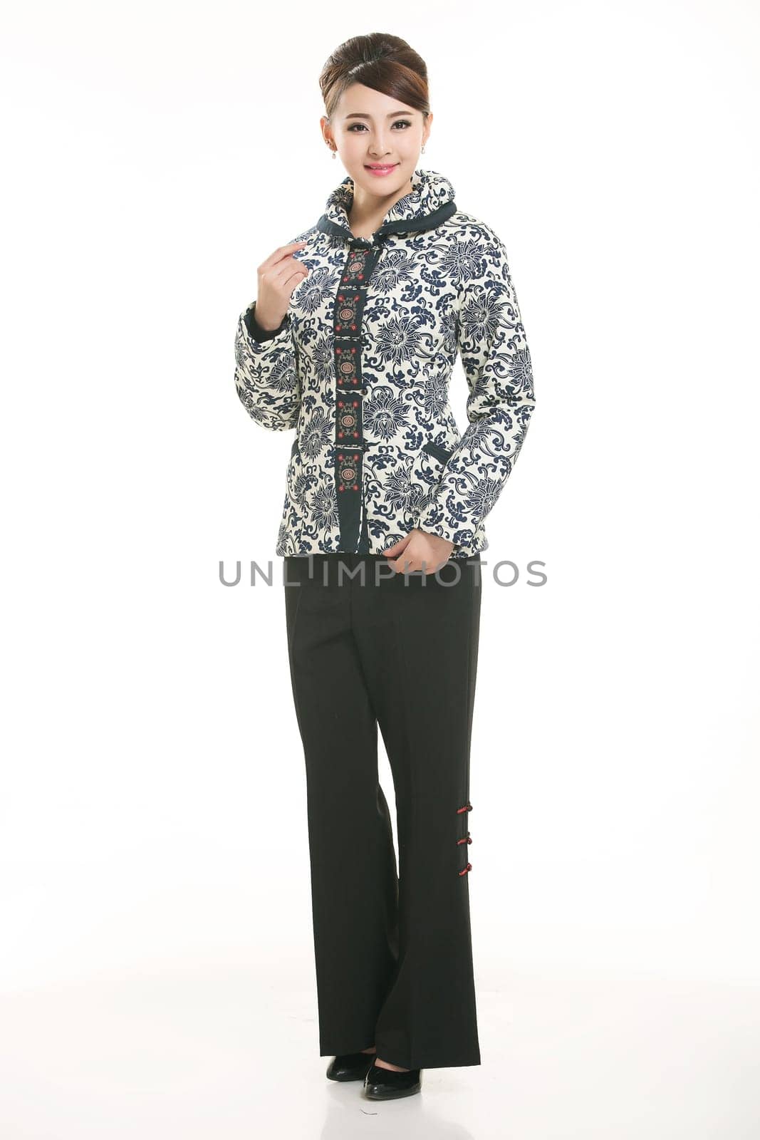 Wearing Chinese clothing waiter in front of a white background