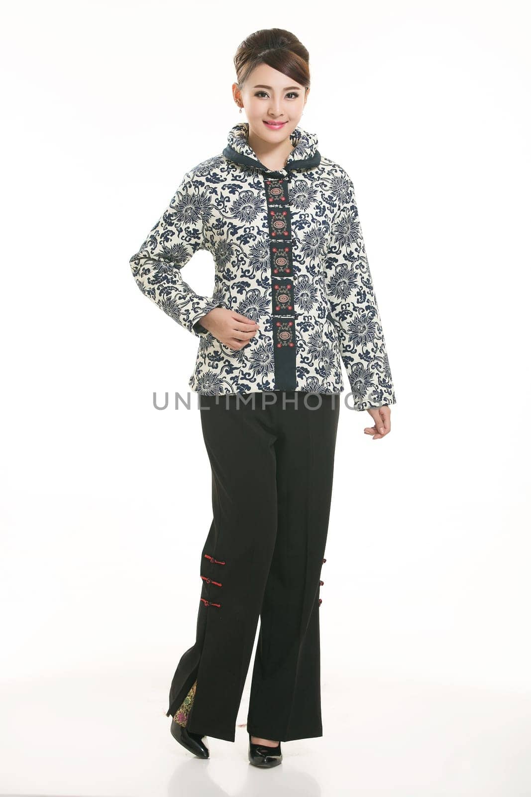 Wearing Chinese clothing waiter in front of a white background