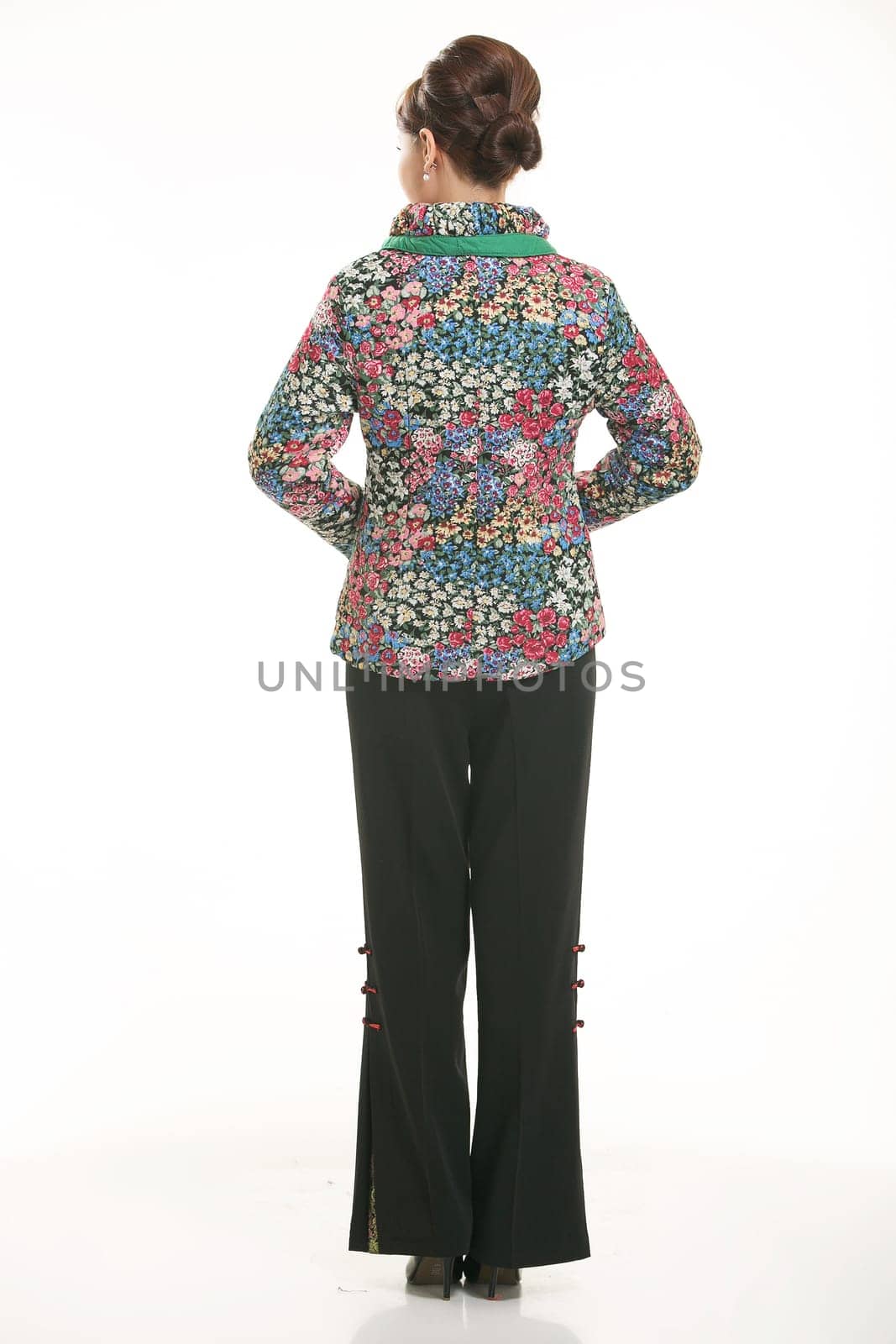 Wearing Chinese clothing waiter in front of a white background
