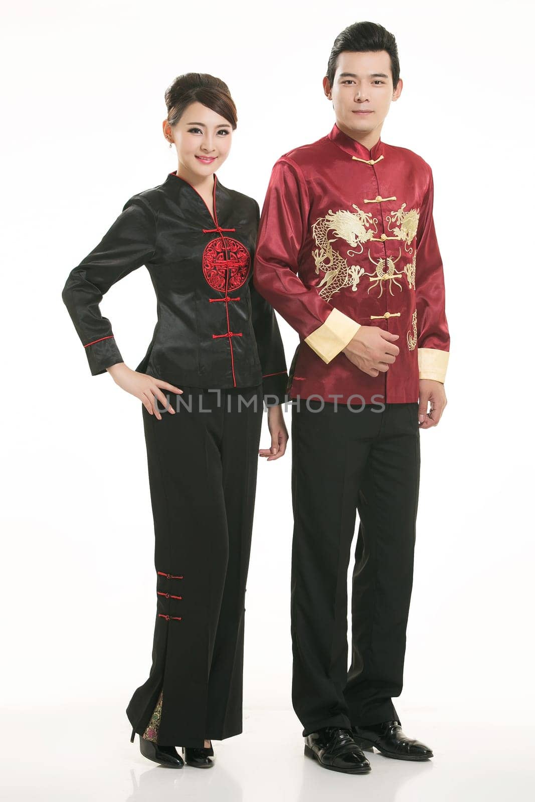 Wearing Chinese clothing waiter in front of a white background