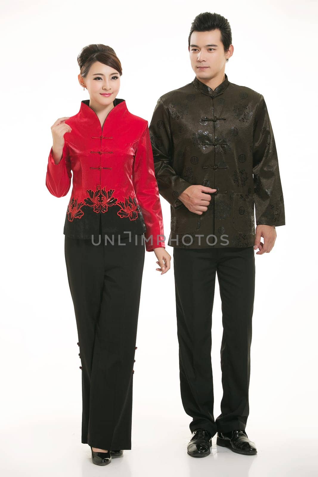 Wearing Chinese clothing waiter in front of a white background